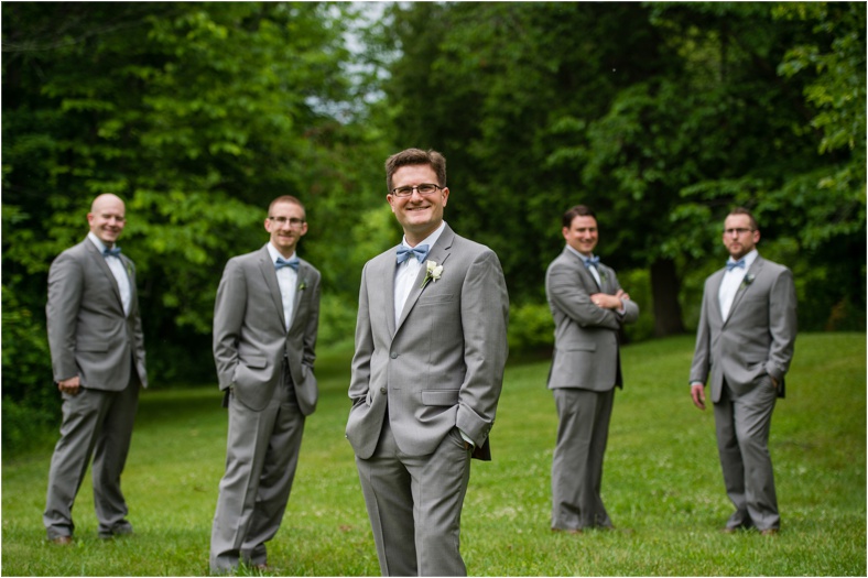 groomsmen in grey tuxes