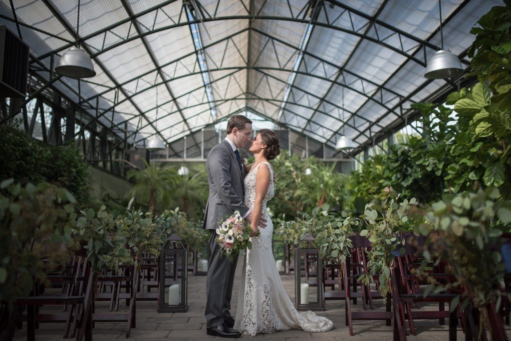 Bride and groom on their wedding day at Planterra Conservatory Wedding