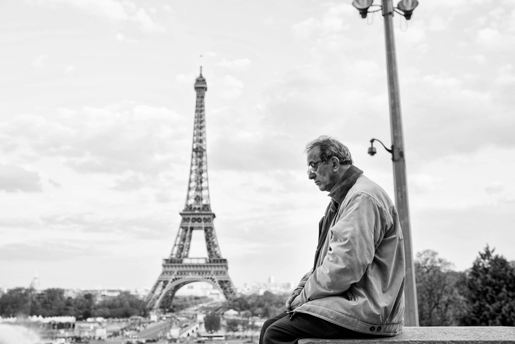 Paris street photography old man and the Eiffel Tower