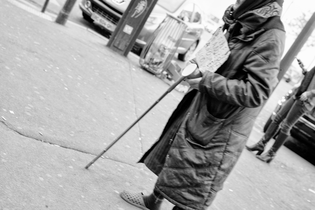 Paris street photography beggar