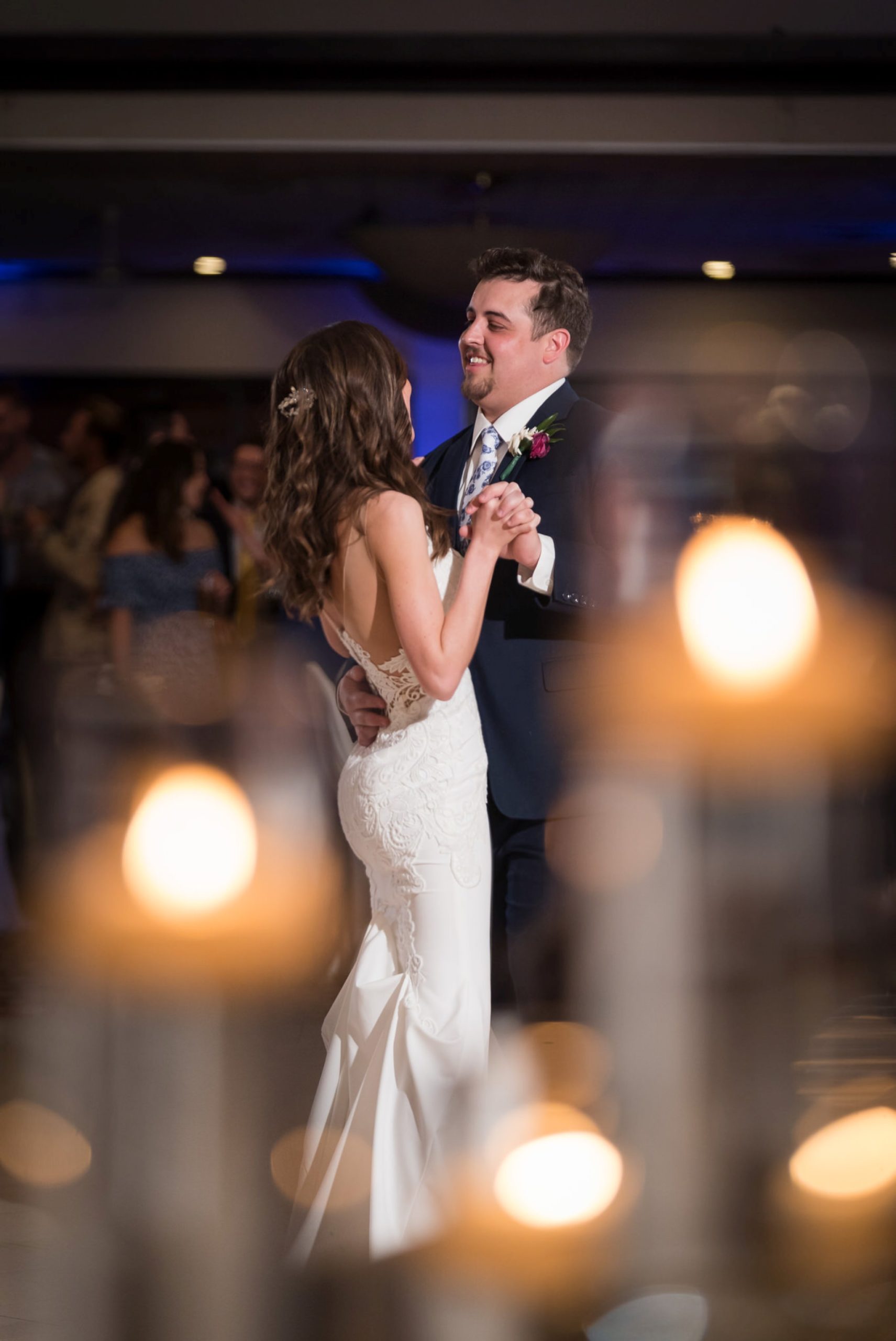 bride and groom dance in candle light at an Italian American Cultural Society Wedding reception