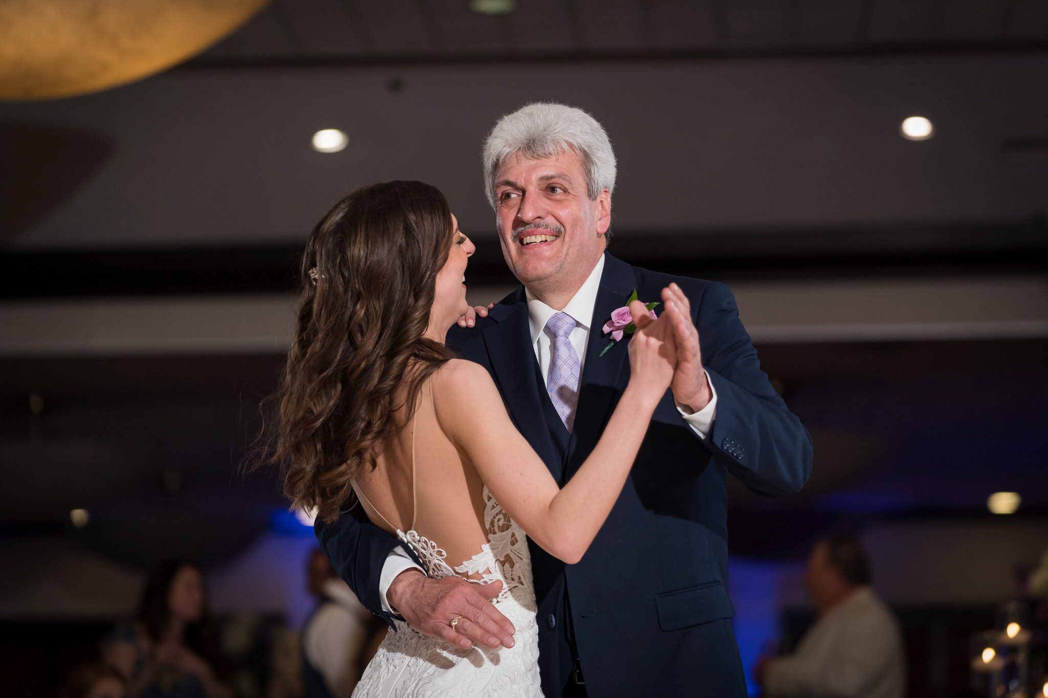 bride and her father dance in candle light at an Italian American Cultural Society Wedding reception