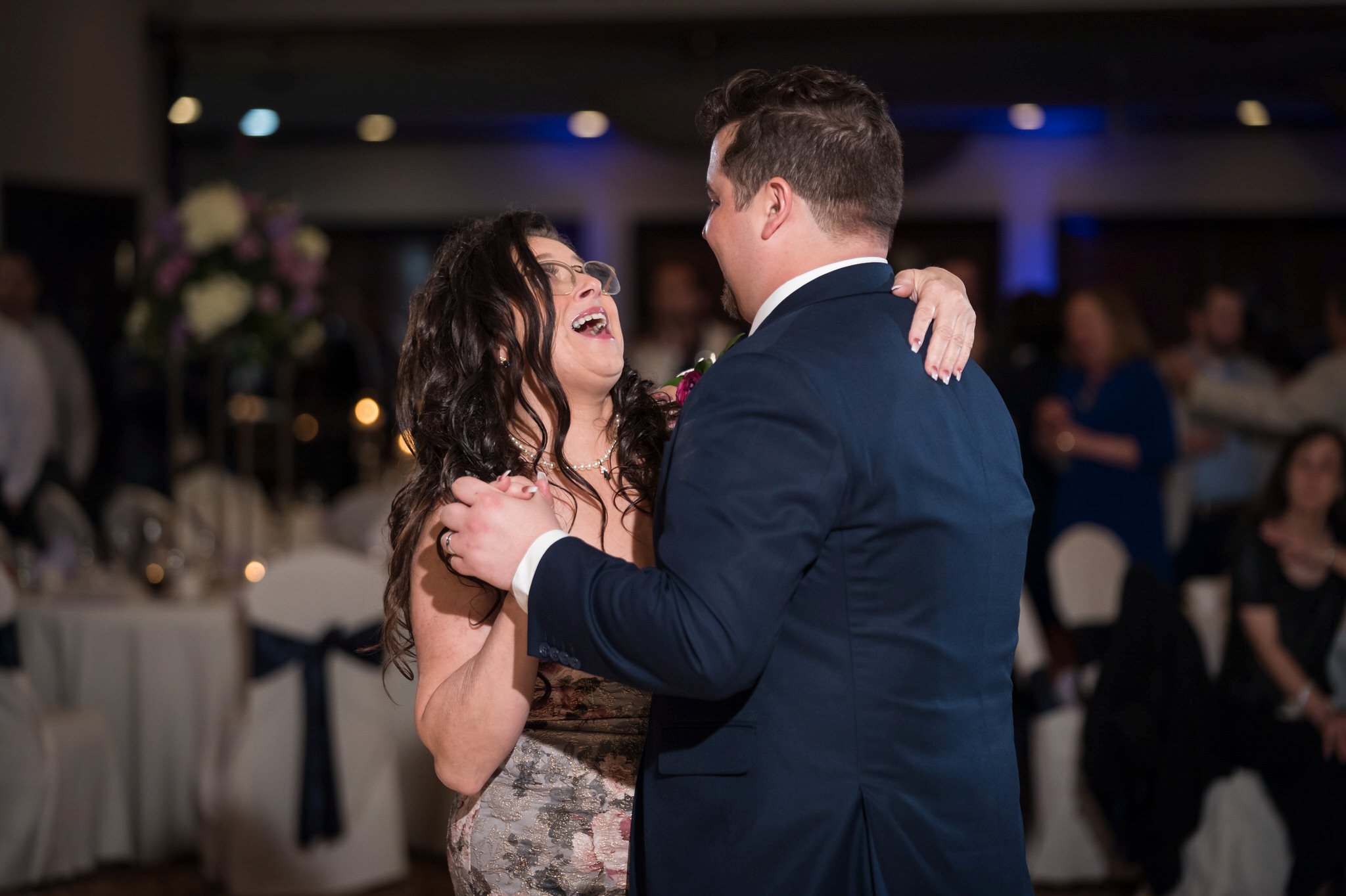 groom and his mother dance at an Italian American Cultural Society Wedding reception