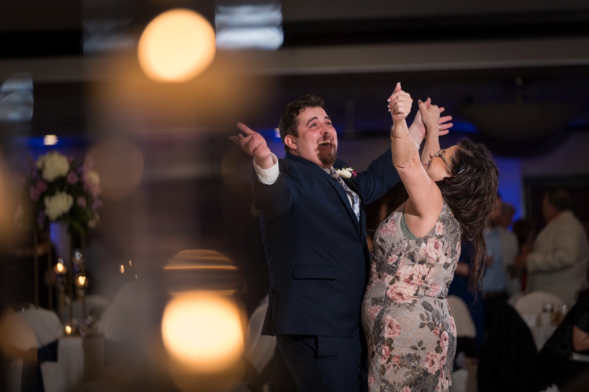 groom and his mother dance at an Italian American Cultural Society Wedding reception