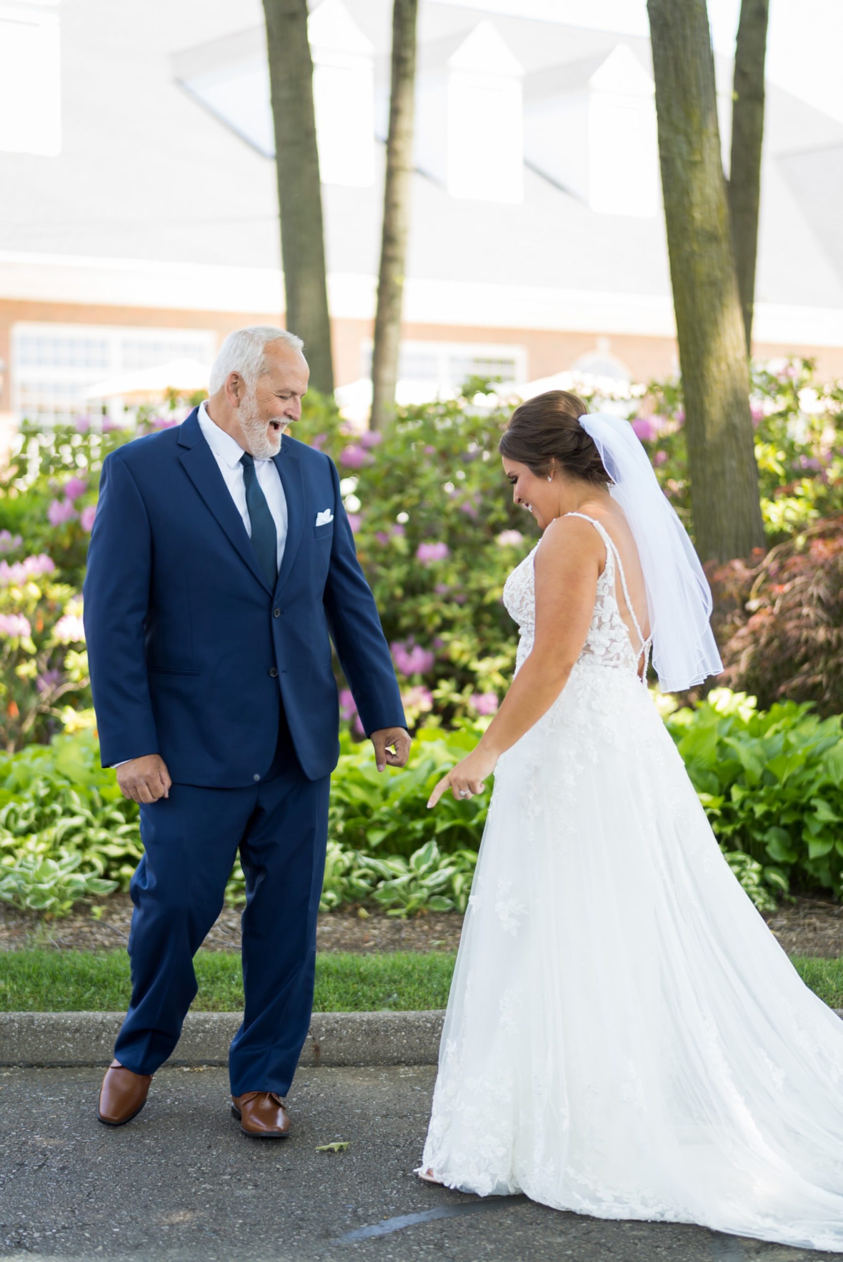 a dad reacts to seeing his daughter at a wedding at Cherry Creek Golf Club