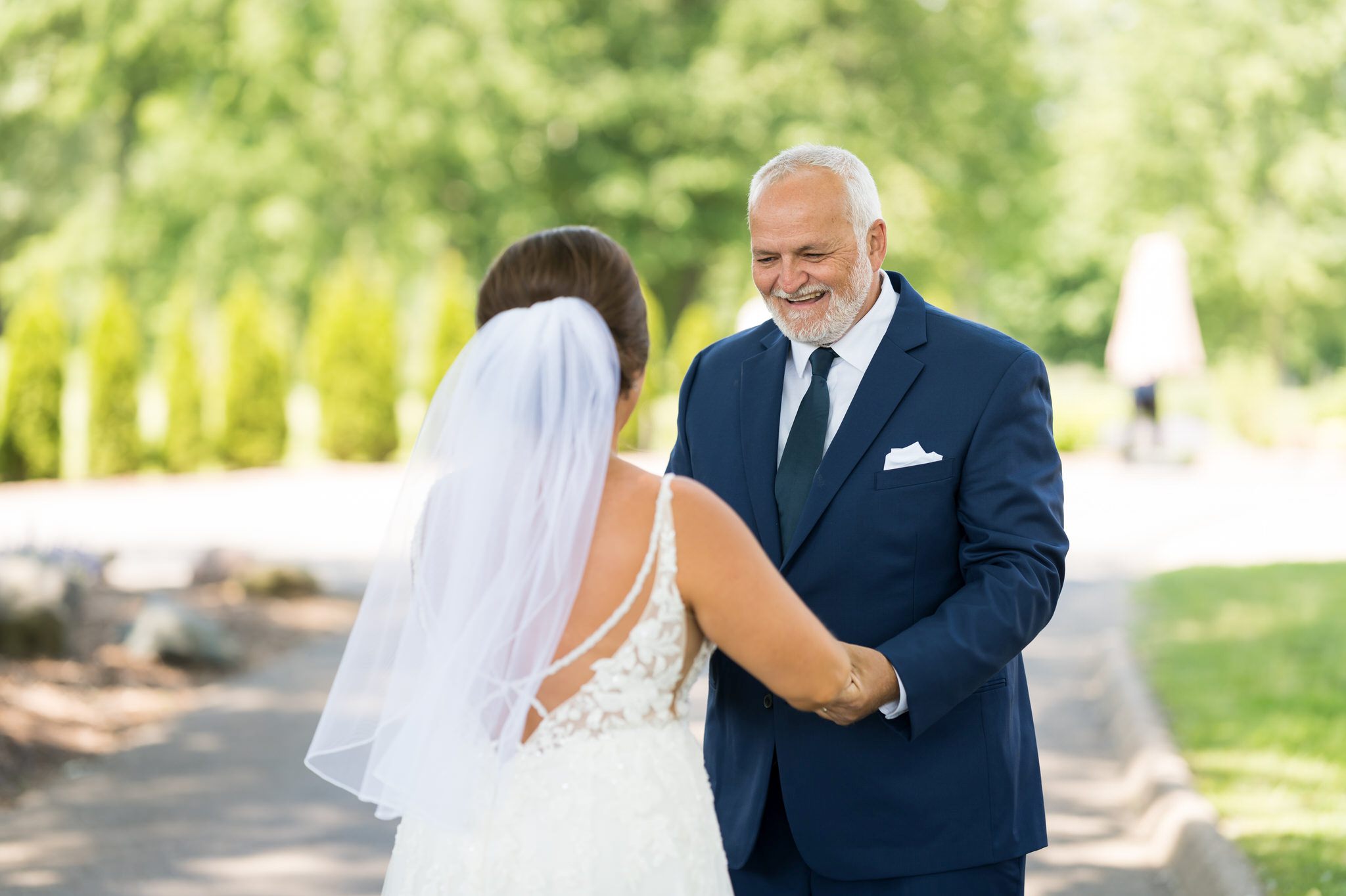 a dad reacts to seeing his daughter at a wedding at Cherry Creek Golf Club