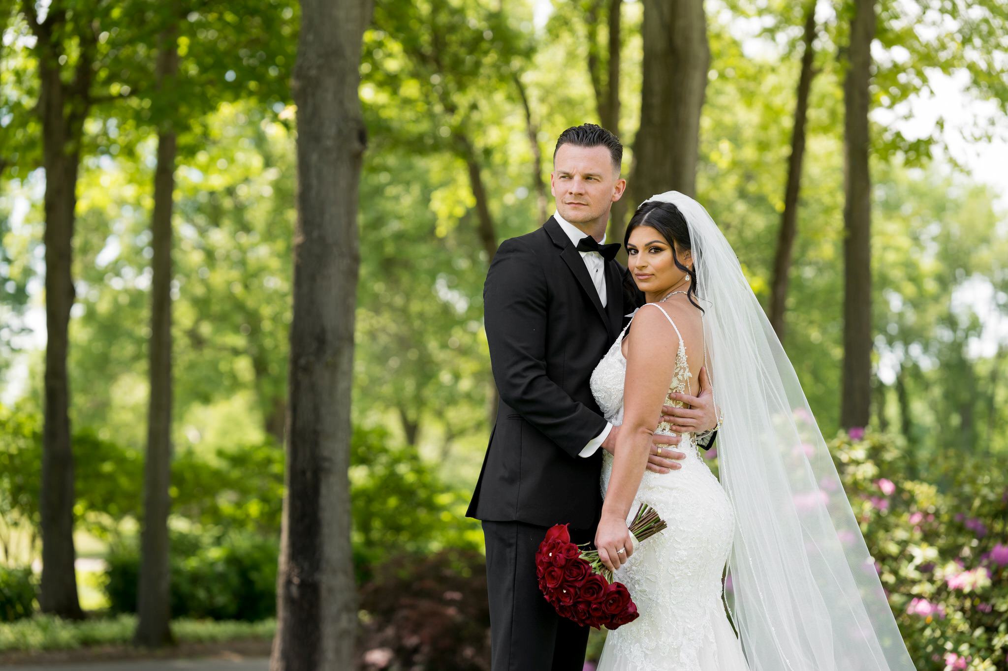 a bride and groom hold each other at their Cherry creek Golf Club wedding
