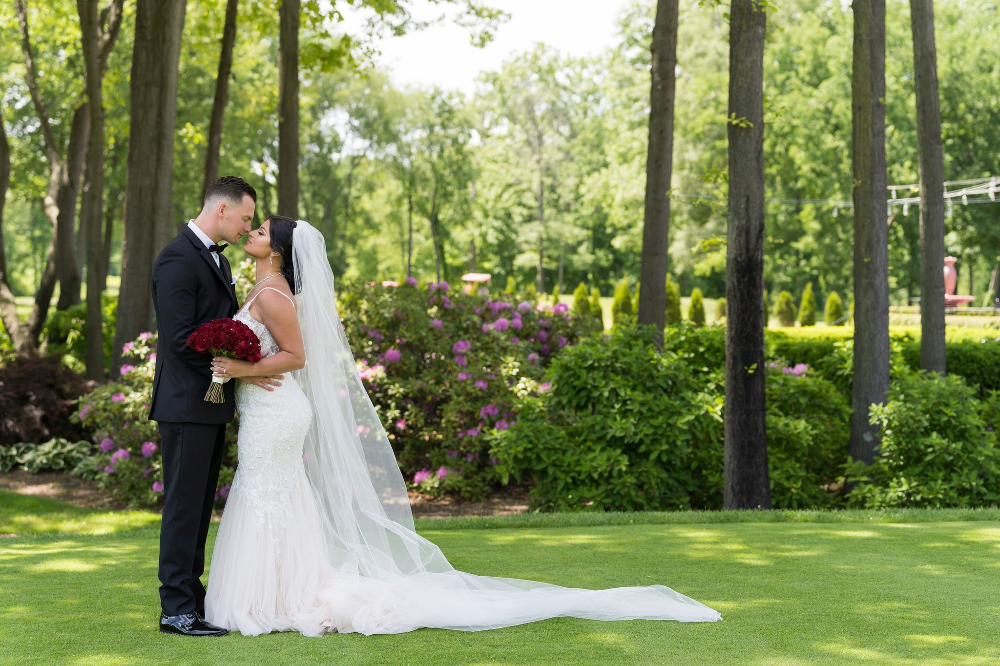 a bride and groom almost kiss at their Cherry creek Golf Club wedding