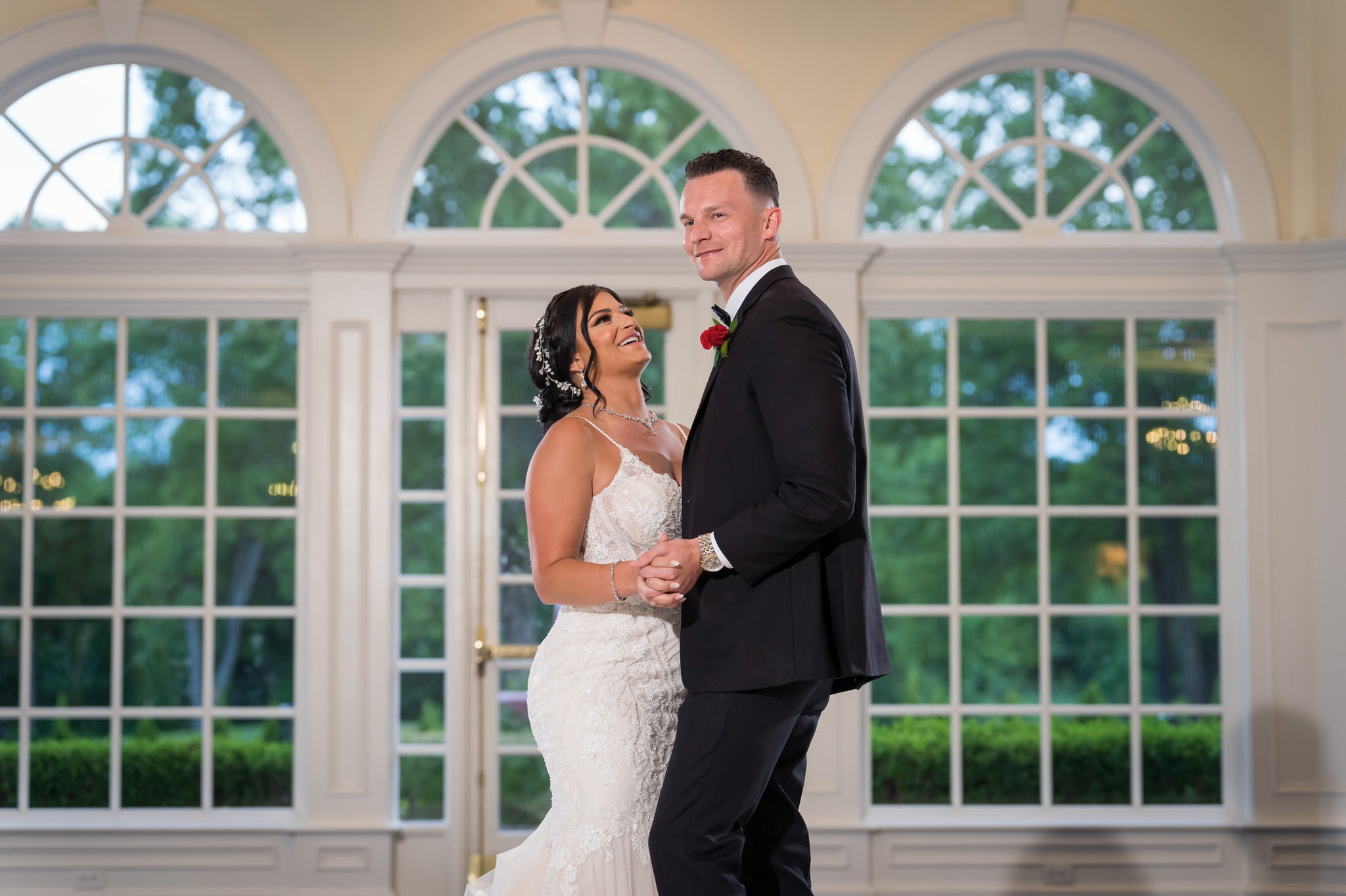 a bride and groom share a first dance at their Cherry Creek Golf Club wedding
