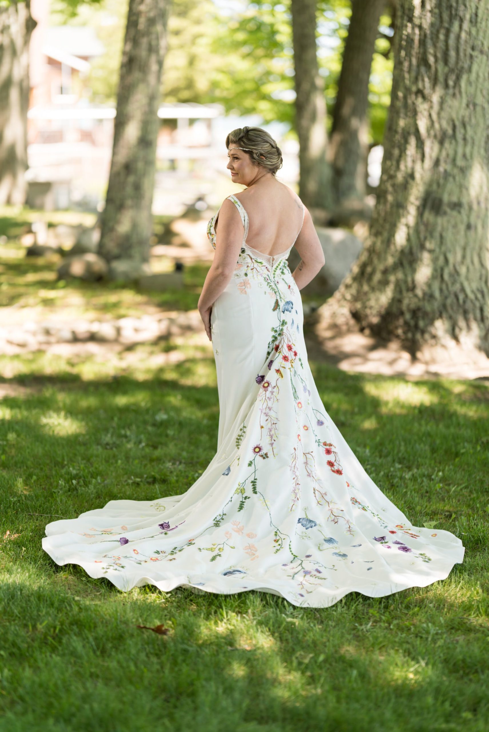 bride with floral dress poses