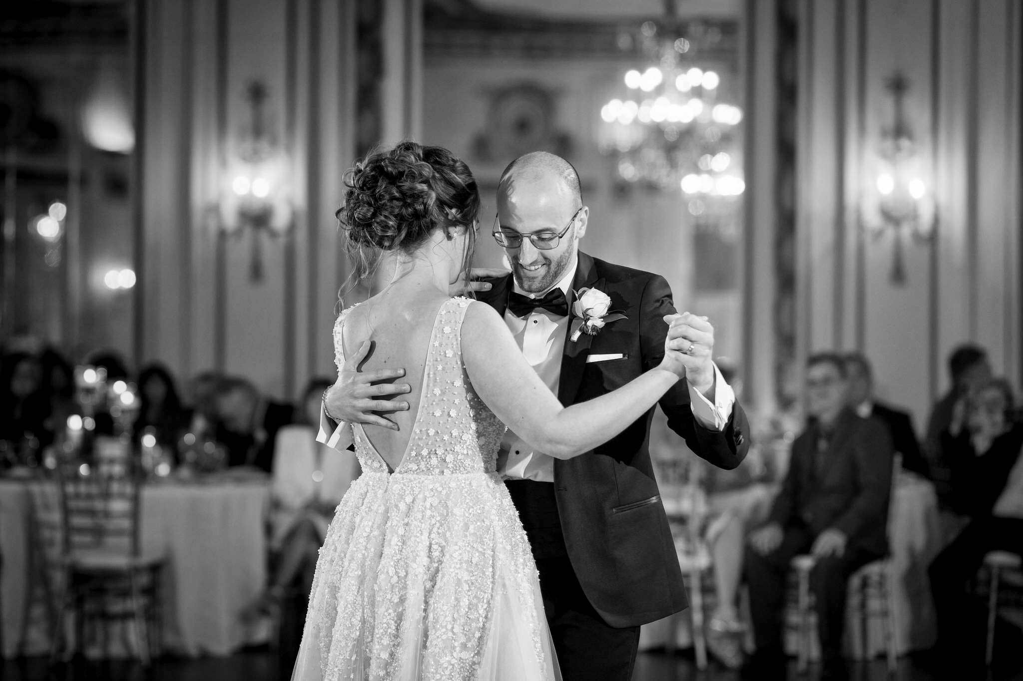 bride and groom dance at their Colony Club wedding 