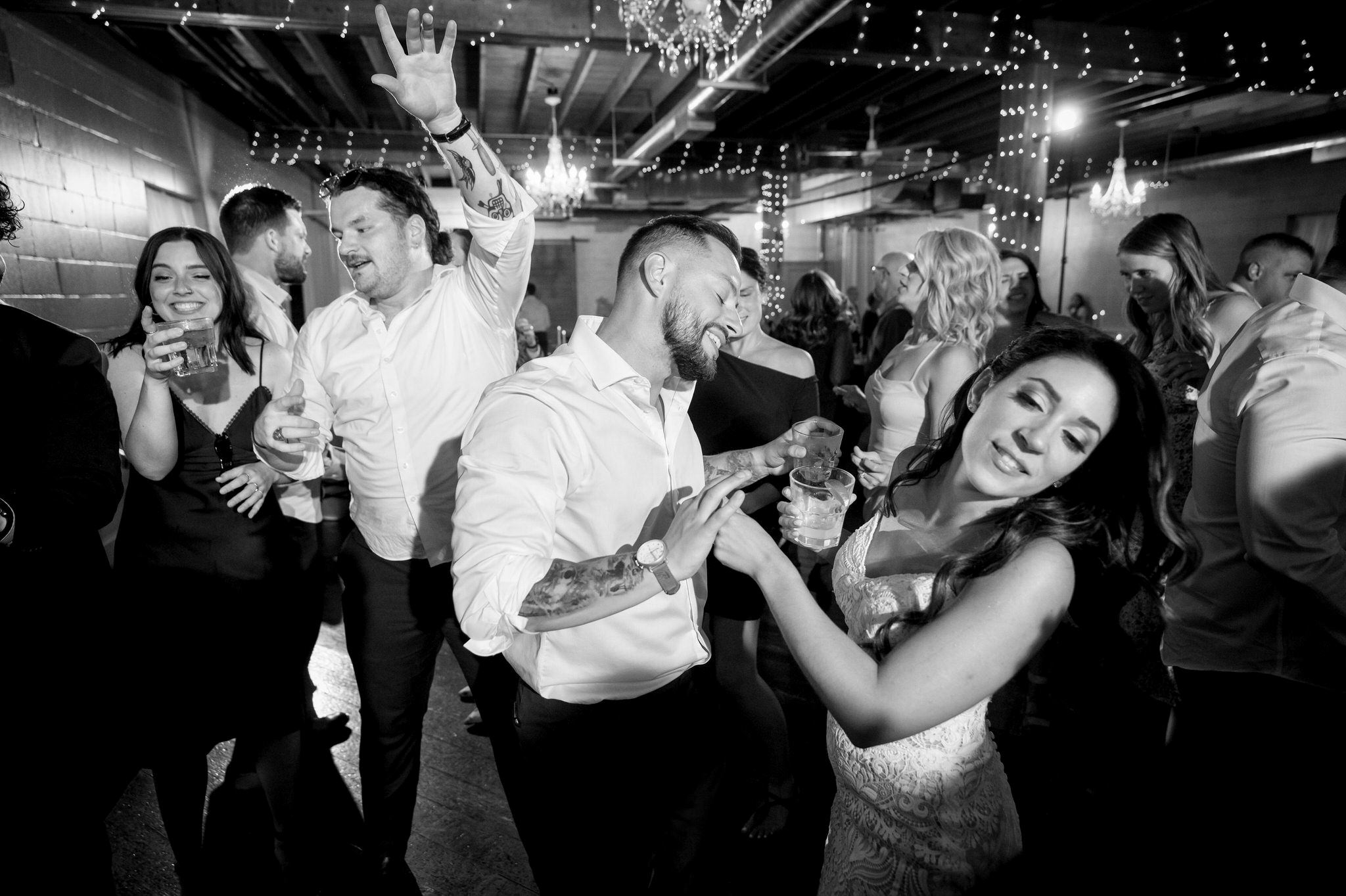bride and groom dance on the dance floor at their Holly Vault wedding reception