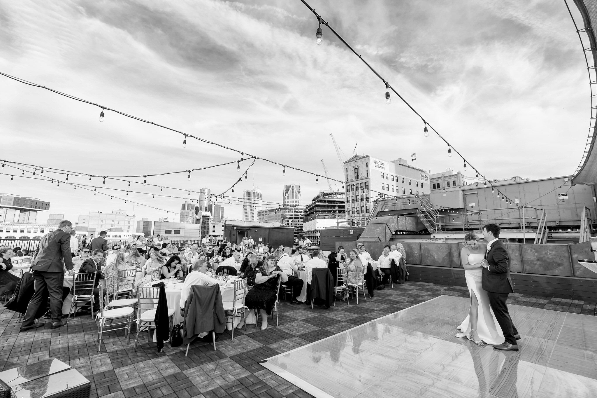 bride and groom dance on a rooftop at a wedding at Detroit Opera House
