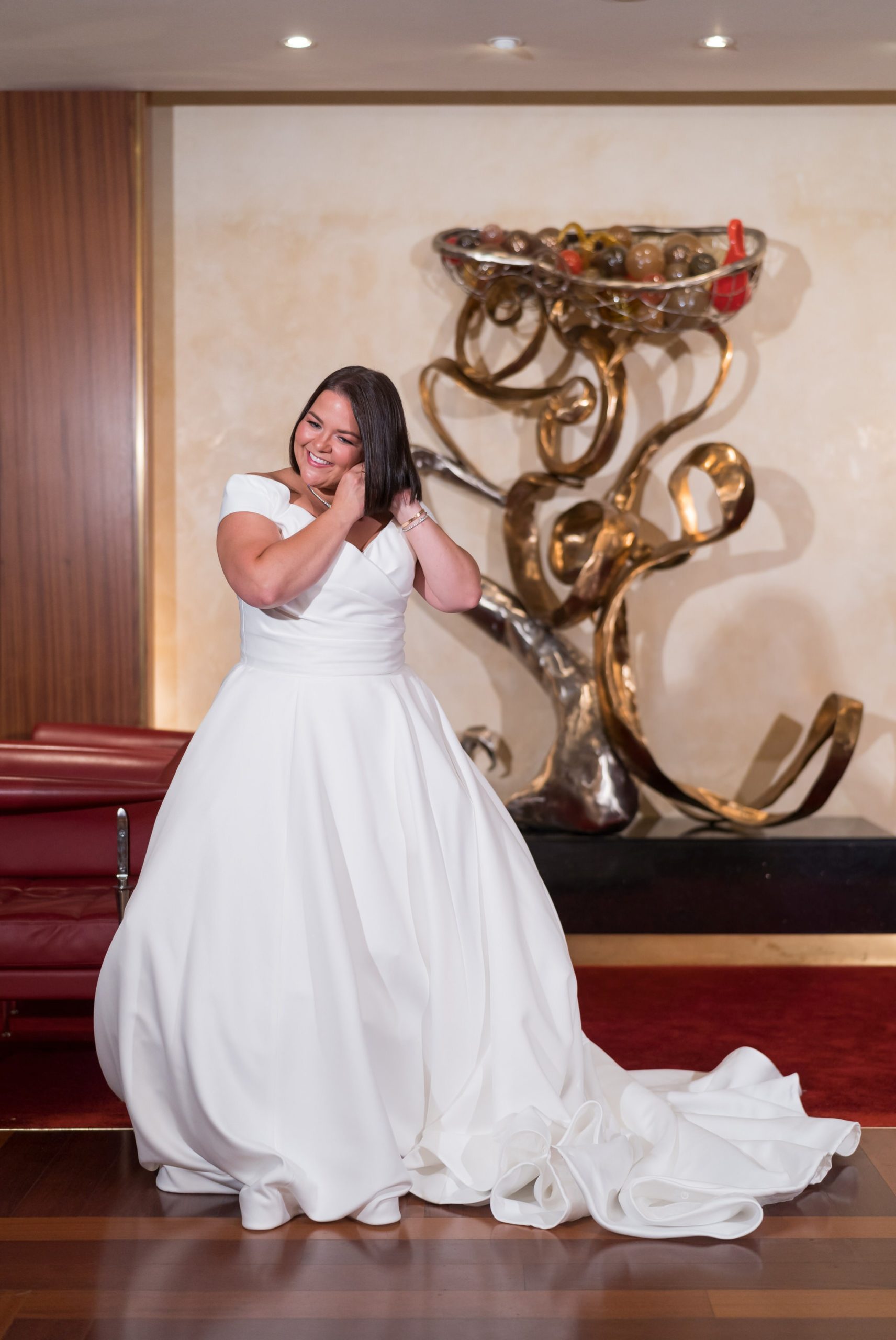 A bride gets ready in the Herman and Sharon Frankel Donor Lounge for her Detroit Orchestra Hall wedding