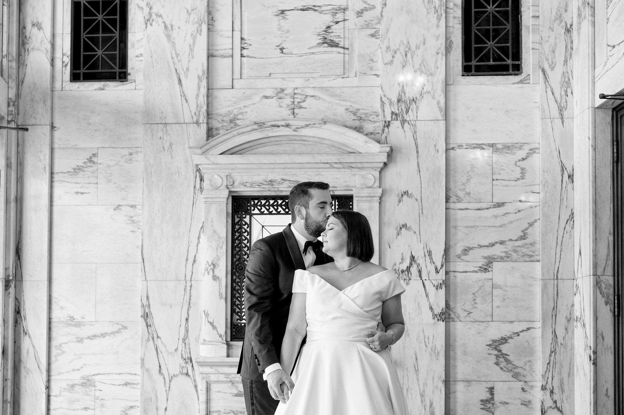 A bride and groom portrait at their Detroit Orchestra Hall wedding by Brian Weitzel Photography.