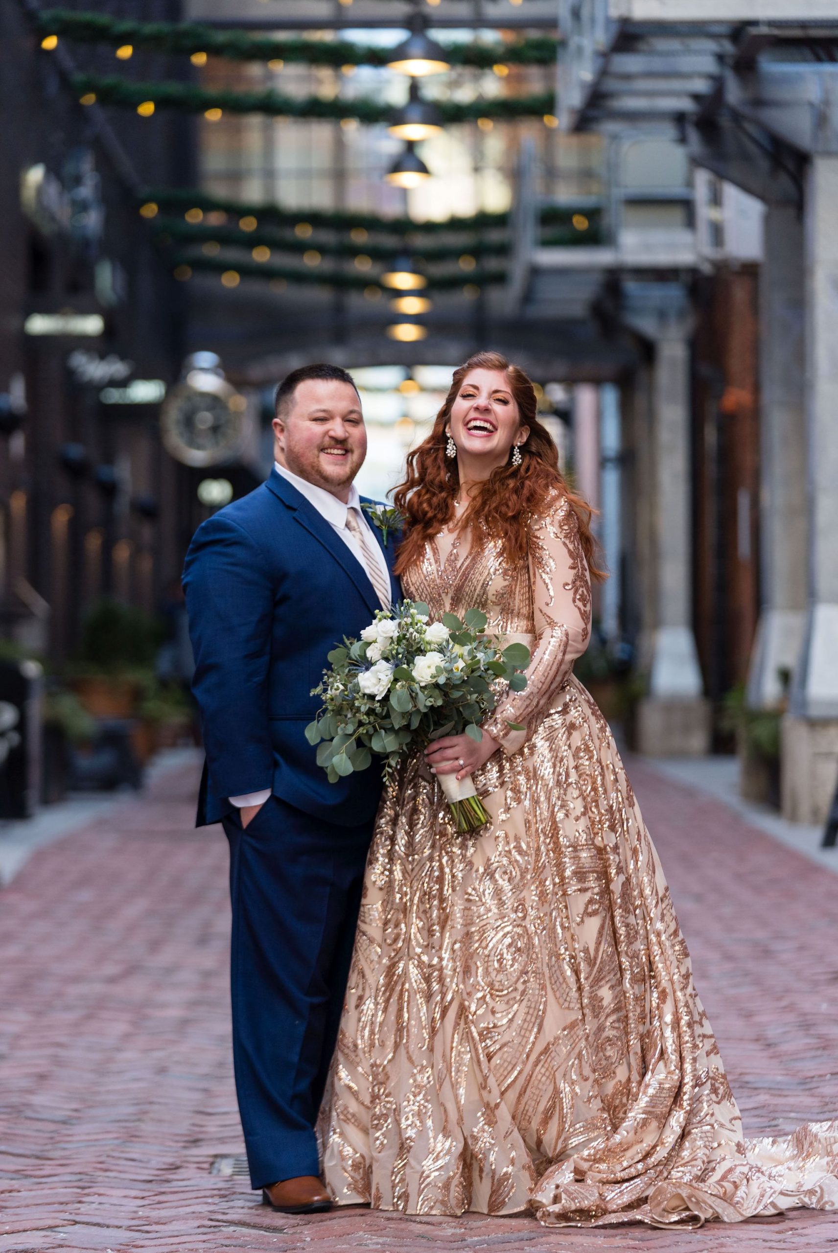 A couple laughs in Parker's Alley during their Detroit elopement.  