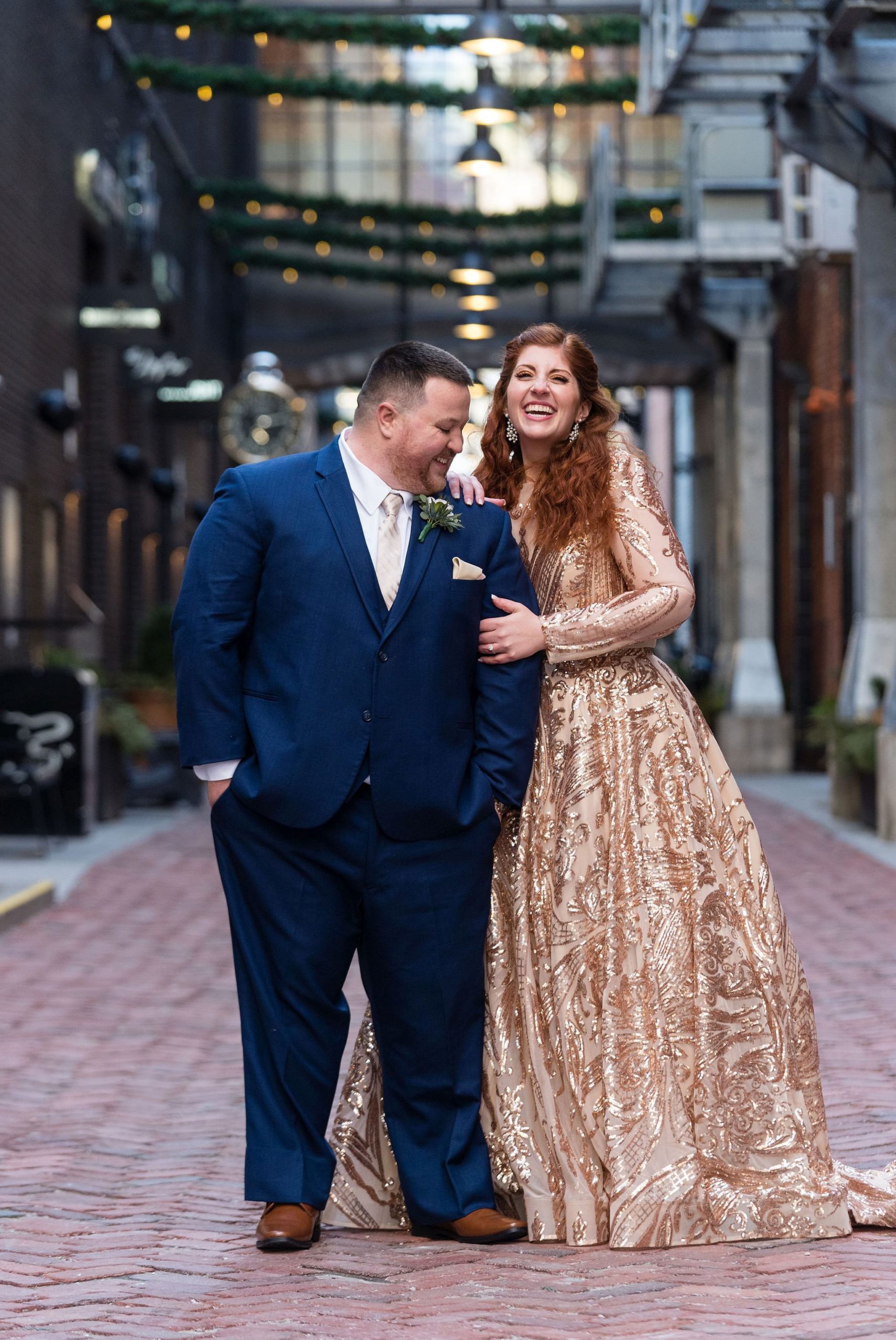 A couple laughs together in Parker's Alley during their secret Detroit elopement. 