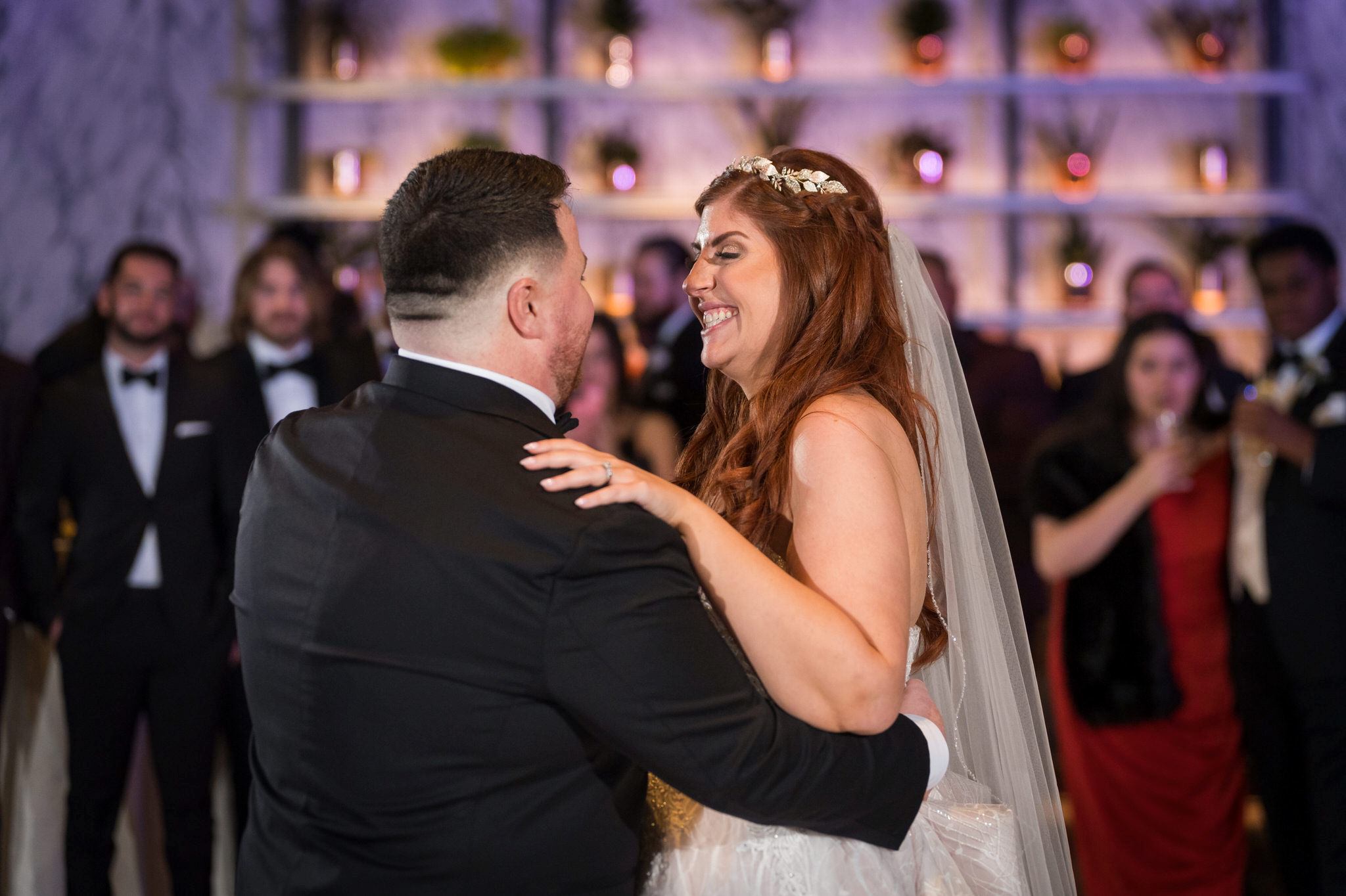 A bride and groom share a first dance at their Shinola Hotel wedding reception.