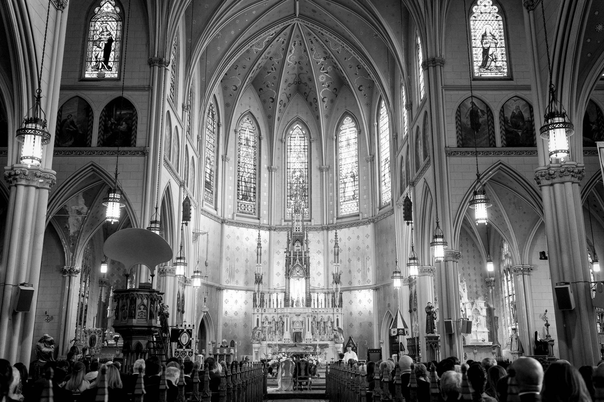 A black and white interior photo of St. Anne de Detroit. 