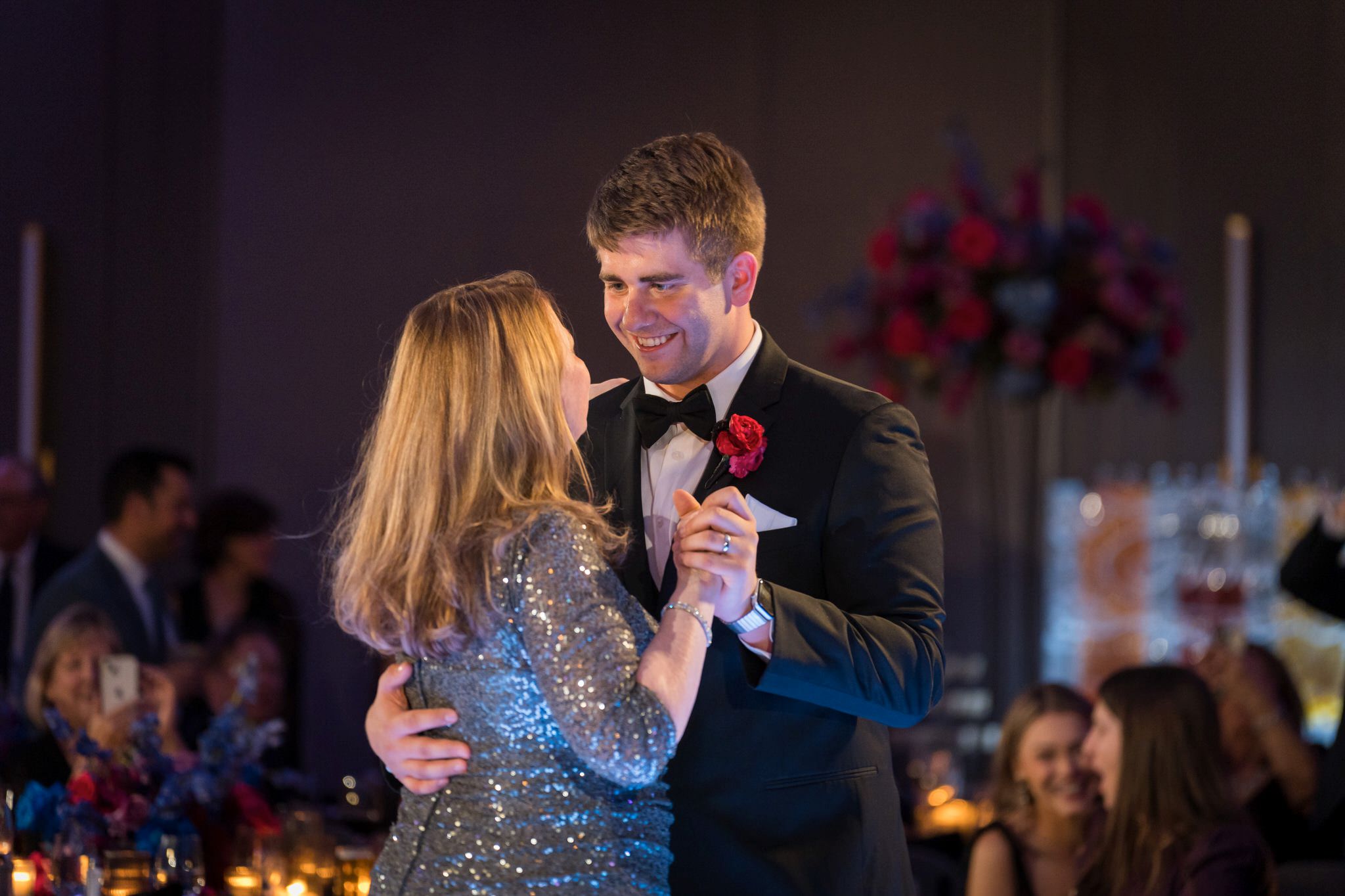 A groom shares a formal dance with his mom on his wedding day at the Daxton Hotel in Birmingham, MI. 