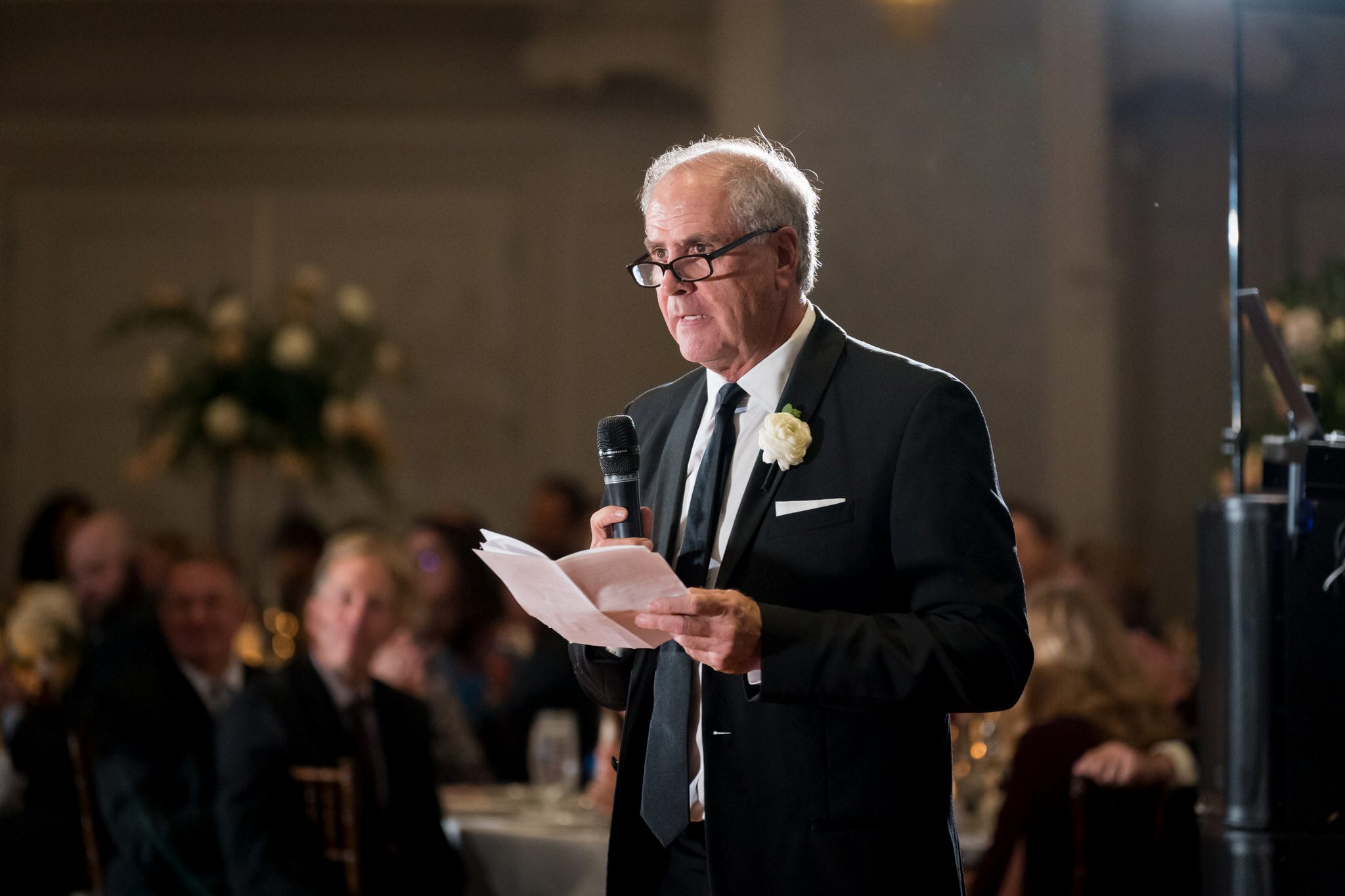 The father of the bride reads a speech at a Westin Book Cadillac wedding.  