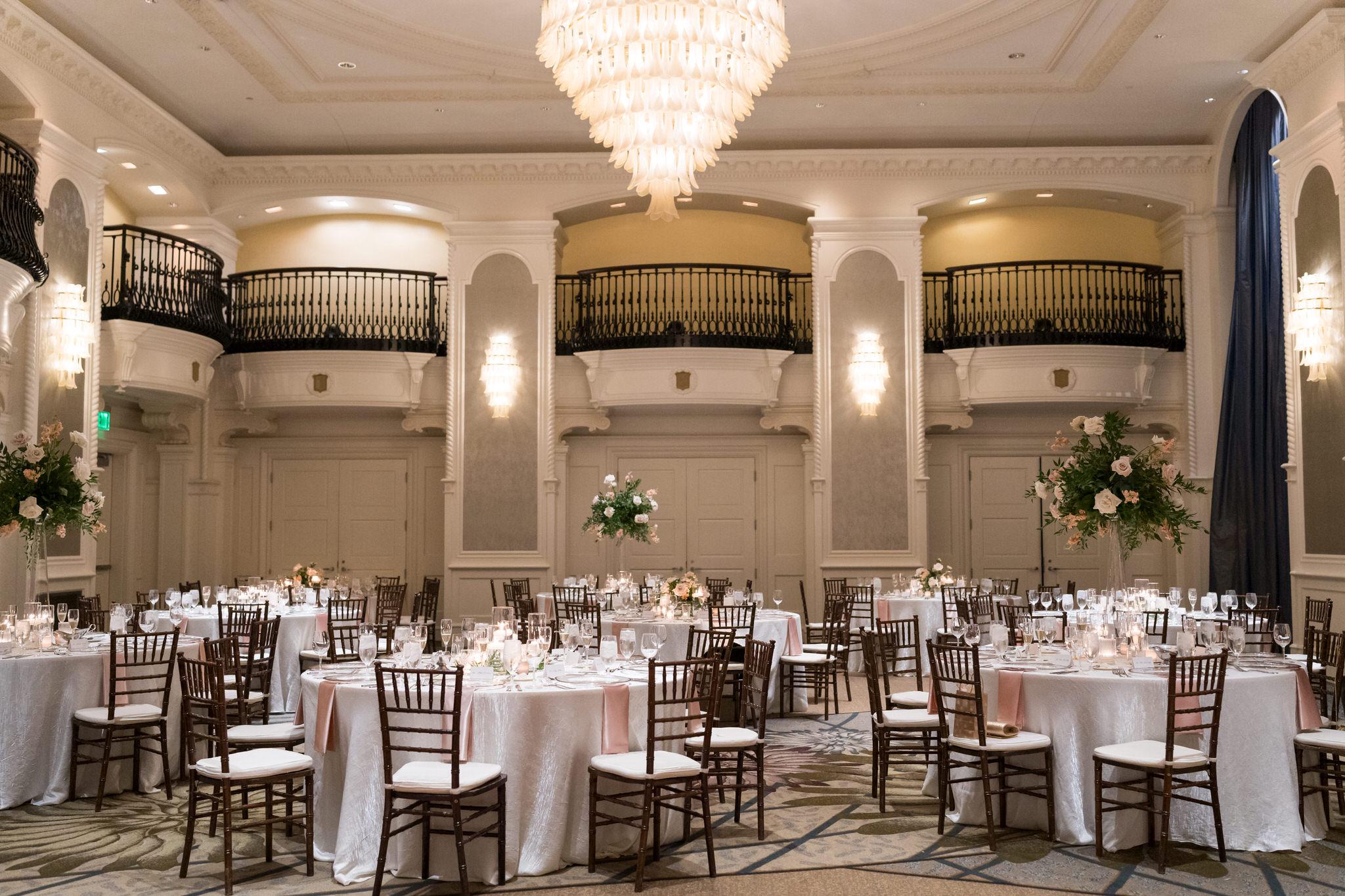 A gorgeous, decorated ballroom from Emerald City Designs at a Westin Book Cadillac wedding reception.  