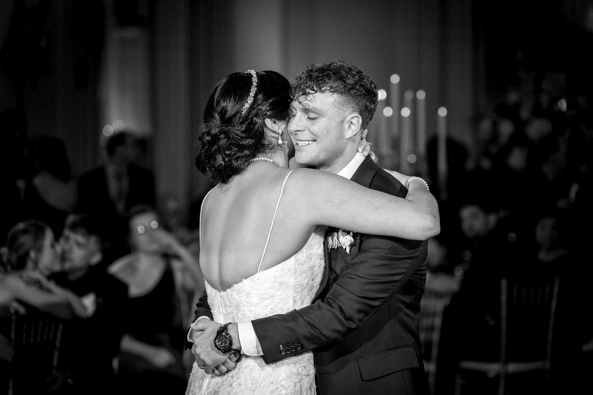 A bride and groom share a first dance at their Colony Club Detroit wedding.