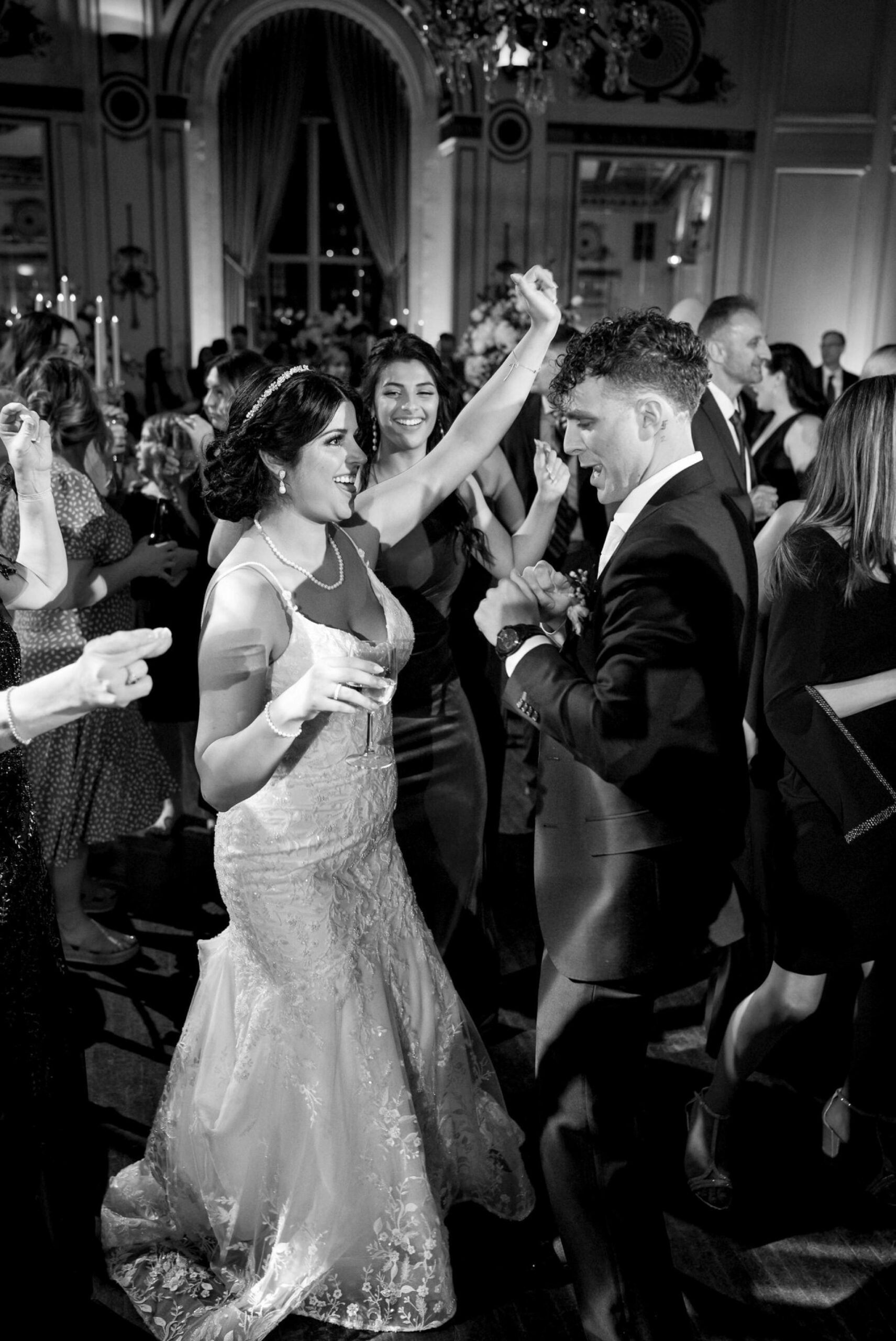 The bride and groom dance and celebrate on their wedding night at their Colony Club Detroit wedding. 
