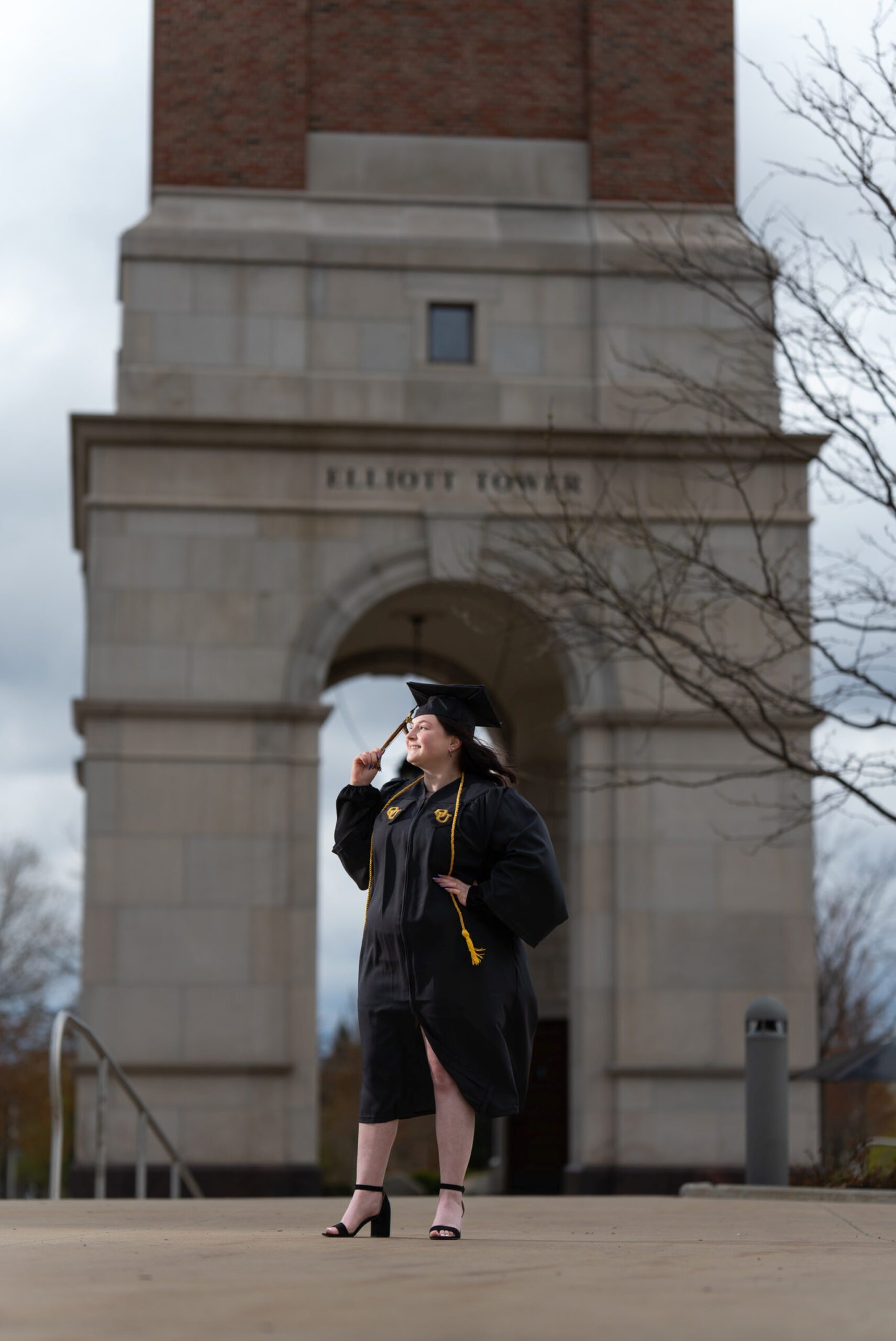 OU College graduation photos in front of Elliot Tower.  