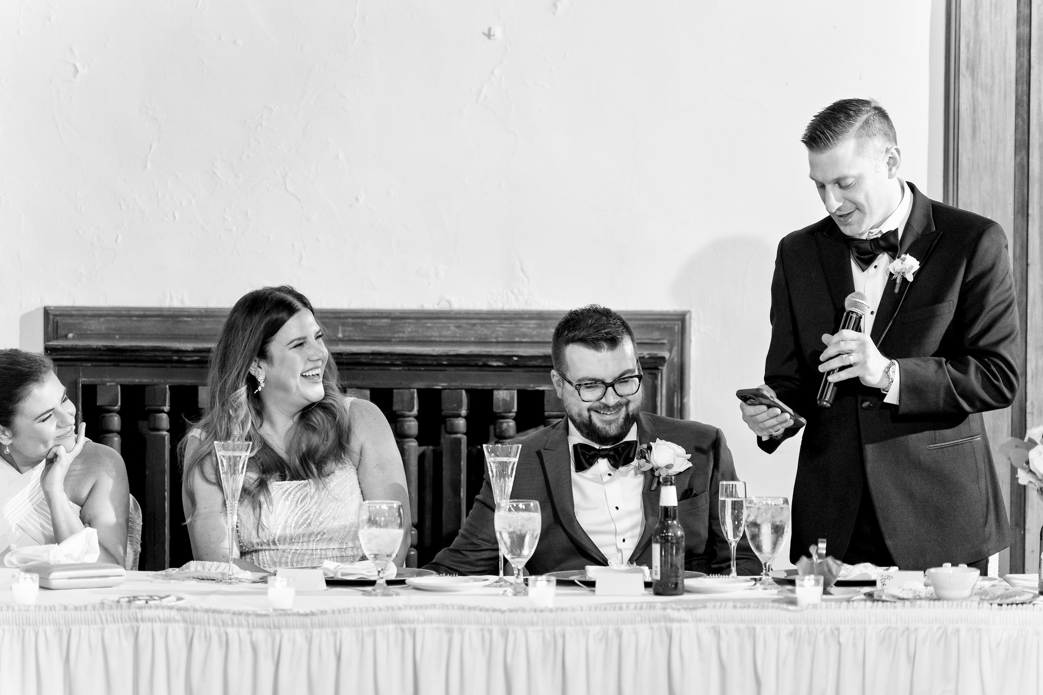 A groomsman gives a speech at a Detroit Yacht Club wedding.  