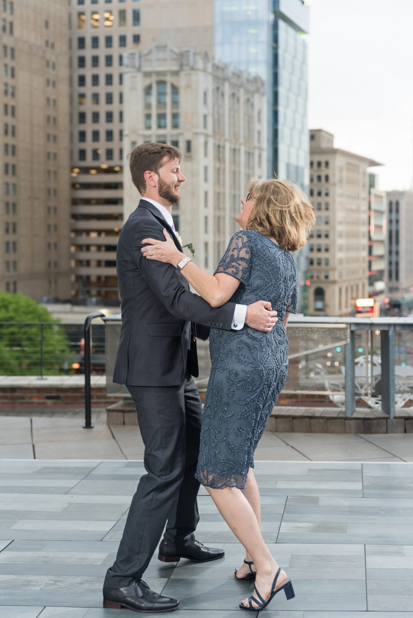 The groom and his mom share a first dance at a Madison Building wedding in Detroit. 