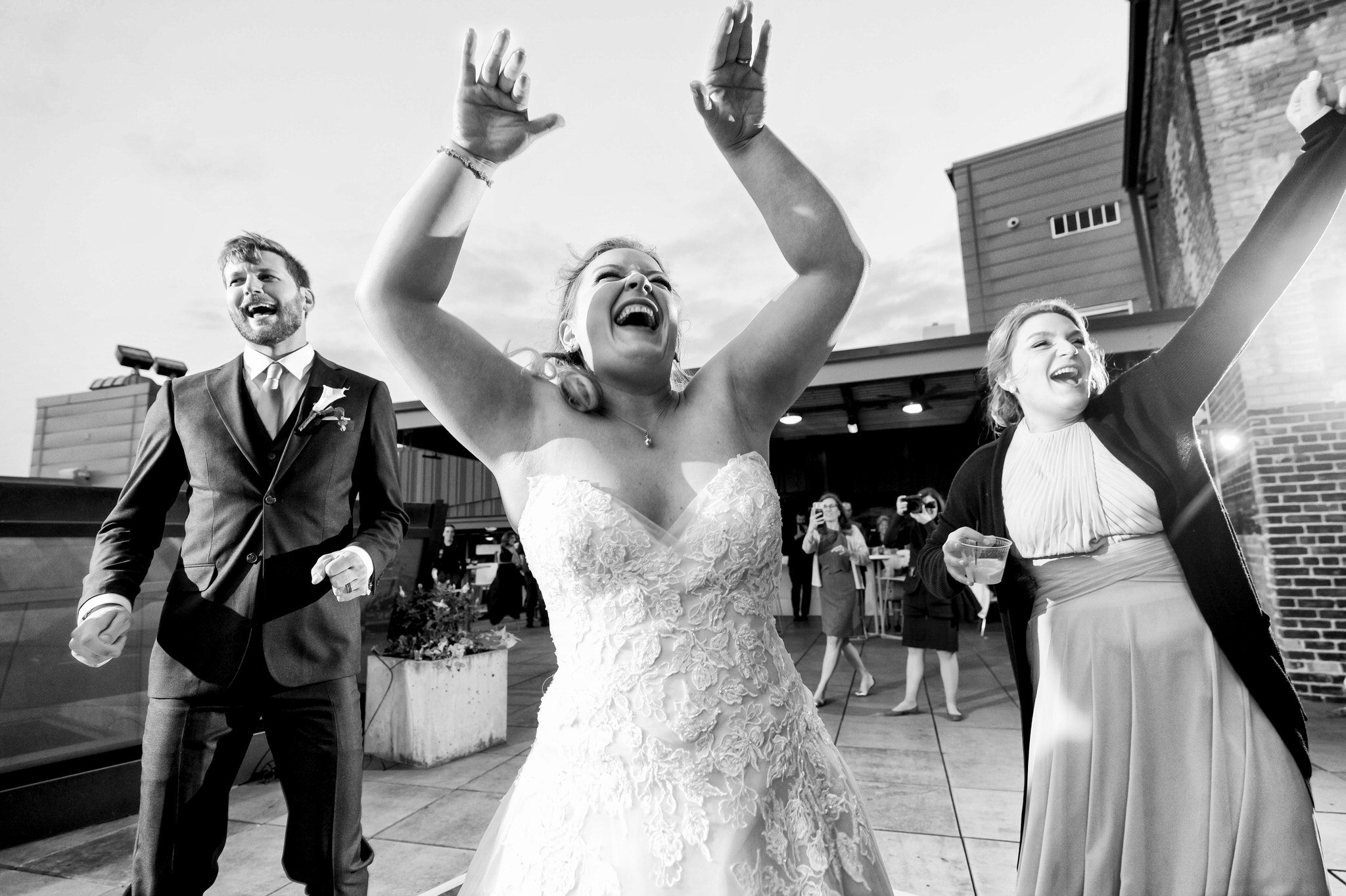 The bride dances on the rooftop at a Madison Building wedding. 
