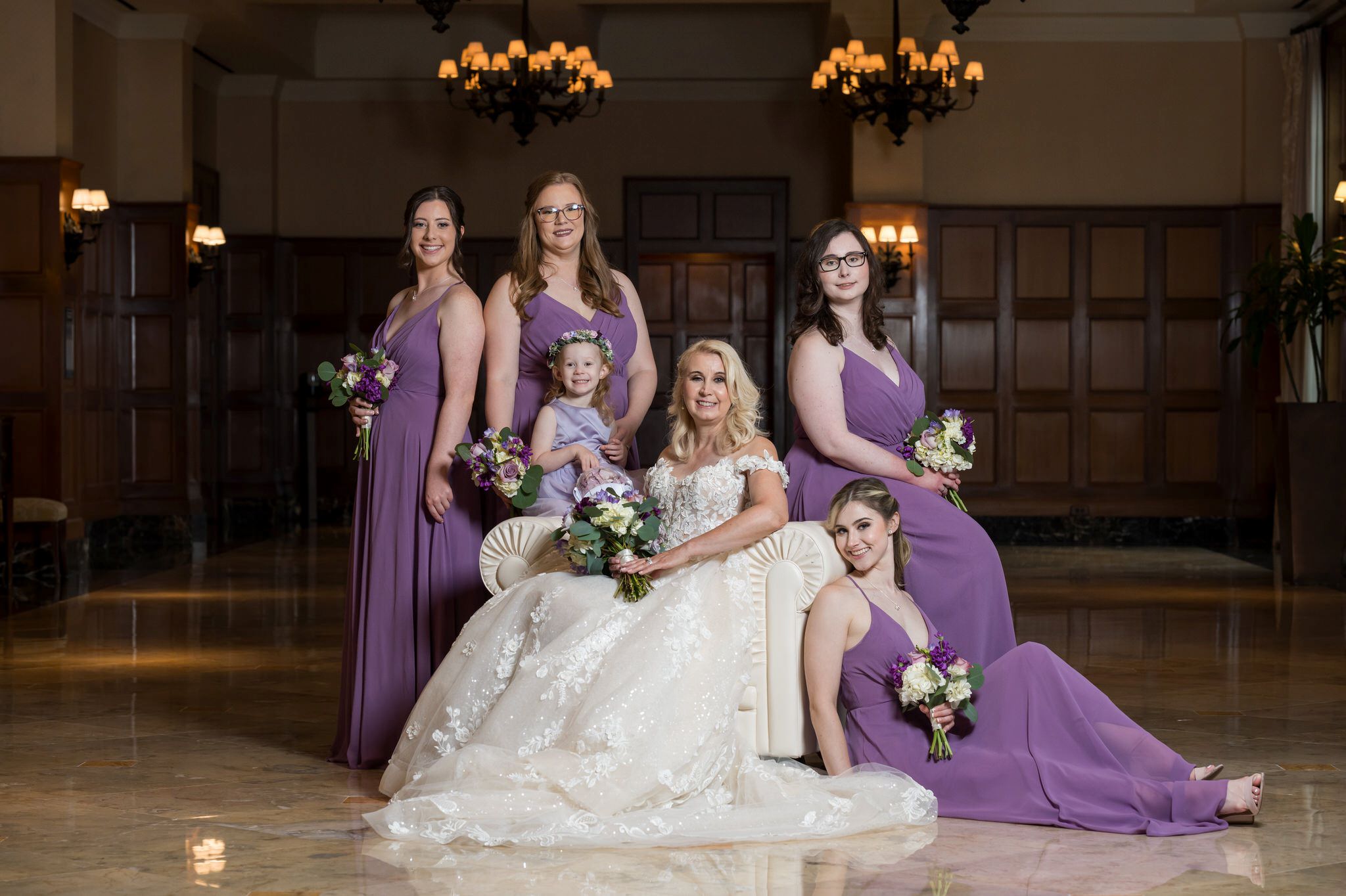 Bridesmaids pose in the lobby of the Royal Park hotel. 