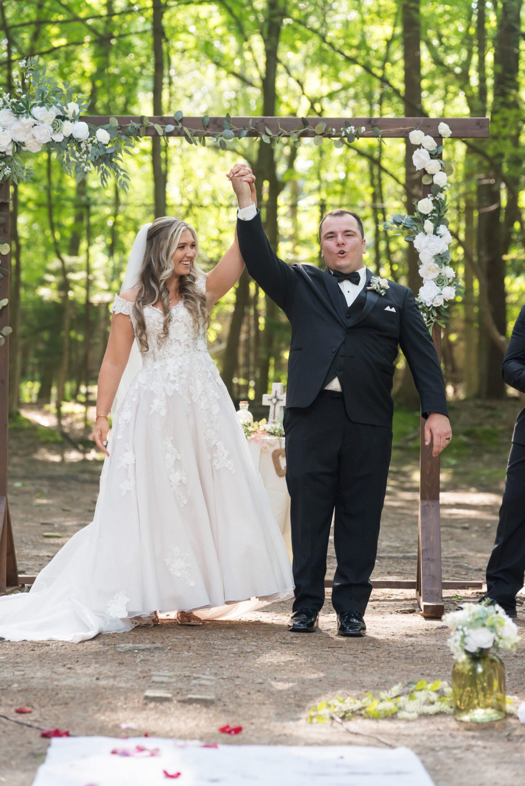 The bride and groom celebrate at their Stony Creek wedding in The Pines.  