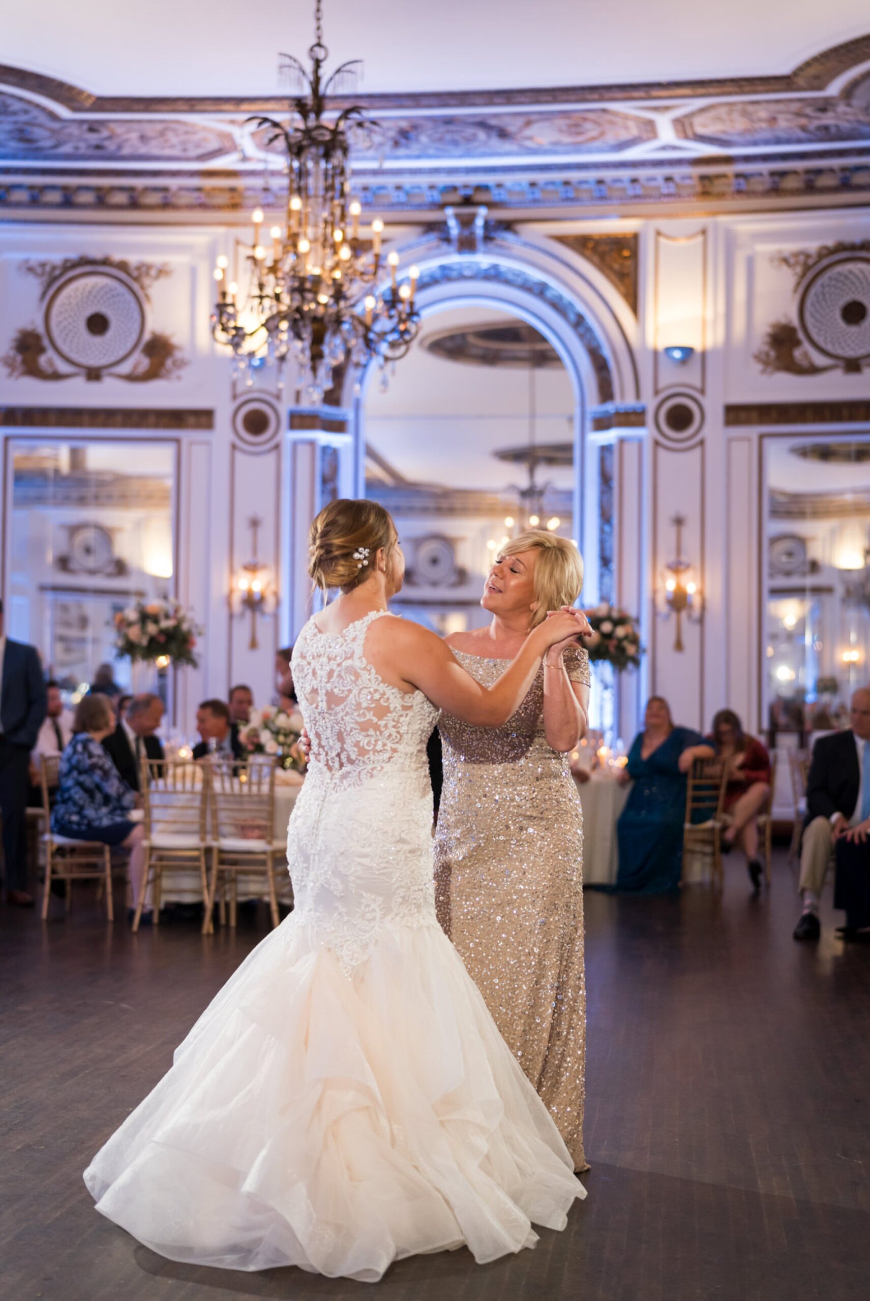Mother and daughter dance at her wedding at the Forbes Hospitality Colony Club. 