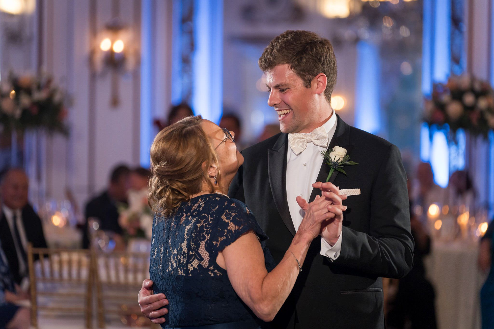 Mother and son dance at his wedding at the Forbes Hospitality Colony Club. 