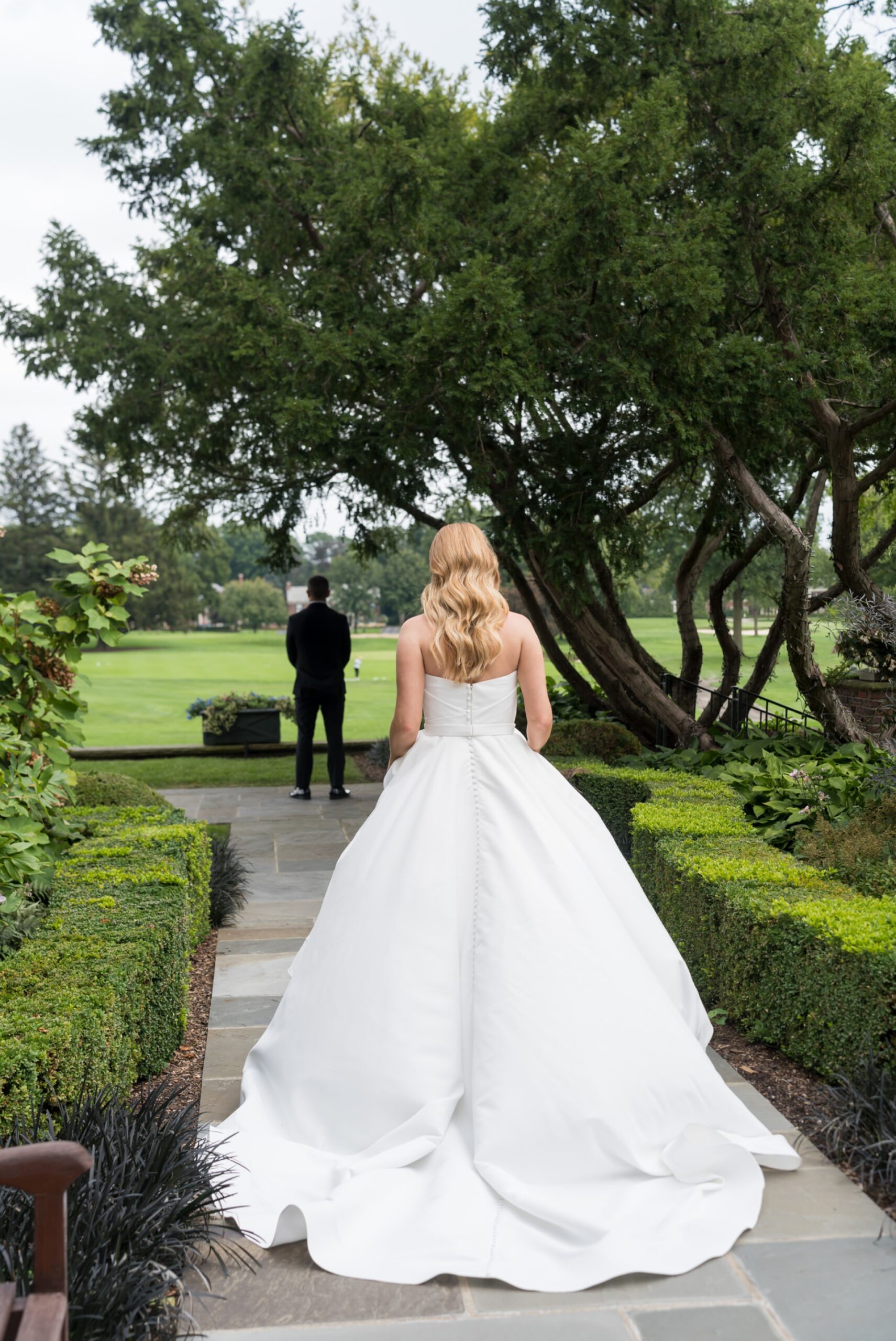A first look between the bride and groom at their Country Club of Detroit wedding.  