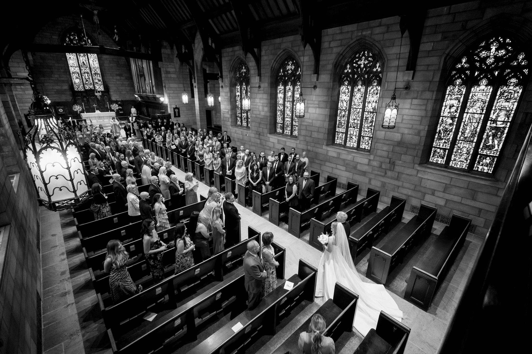 The bride walks down their aisle with her father at Christ Church Grosse Pointe wedding.  