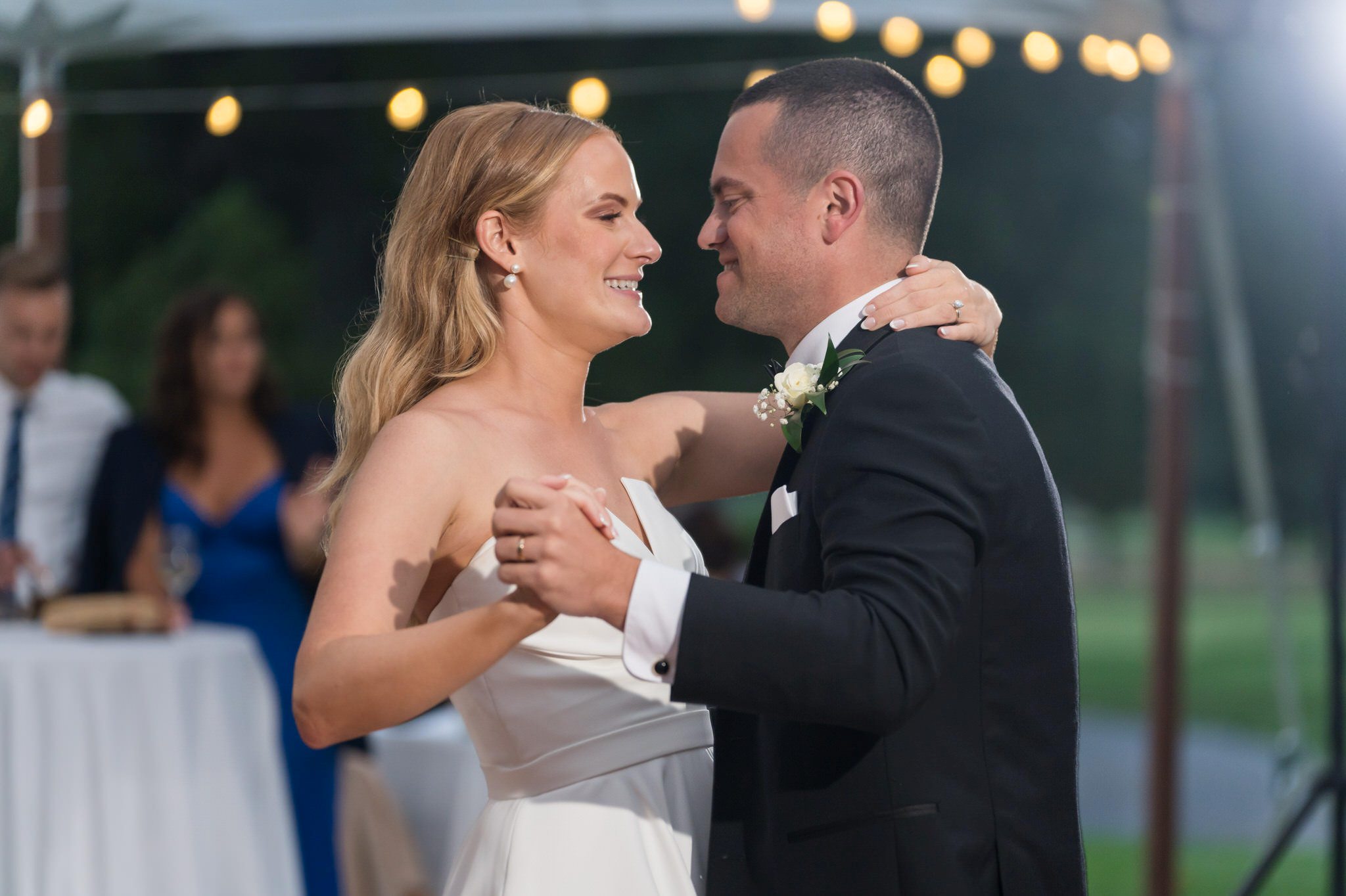 Bride and groom share a first dance during a Country Club of Detroit wedding reception.  