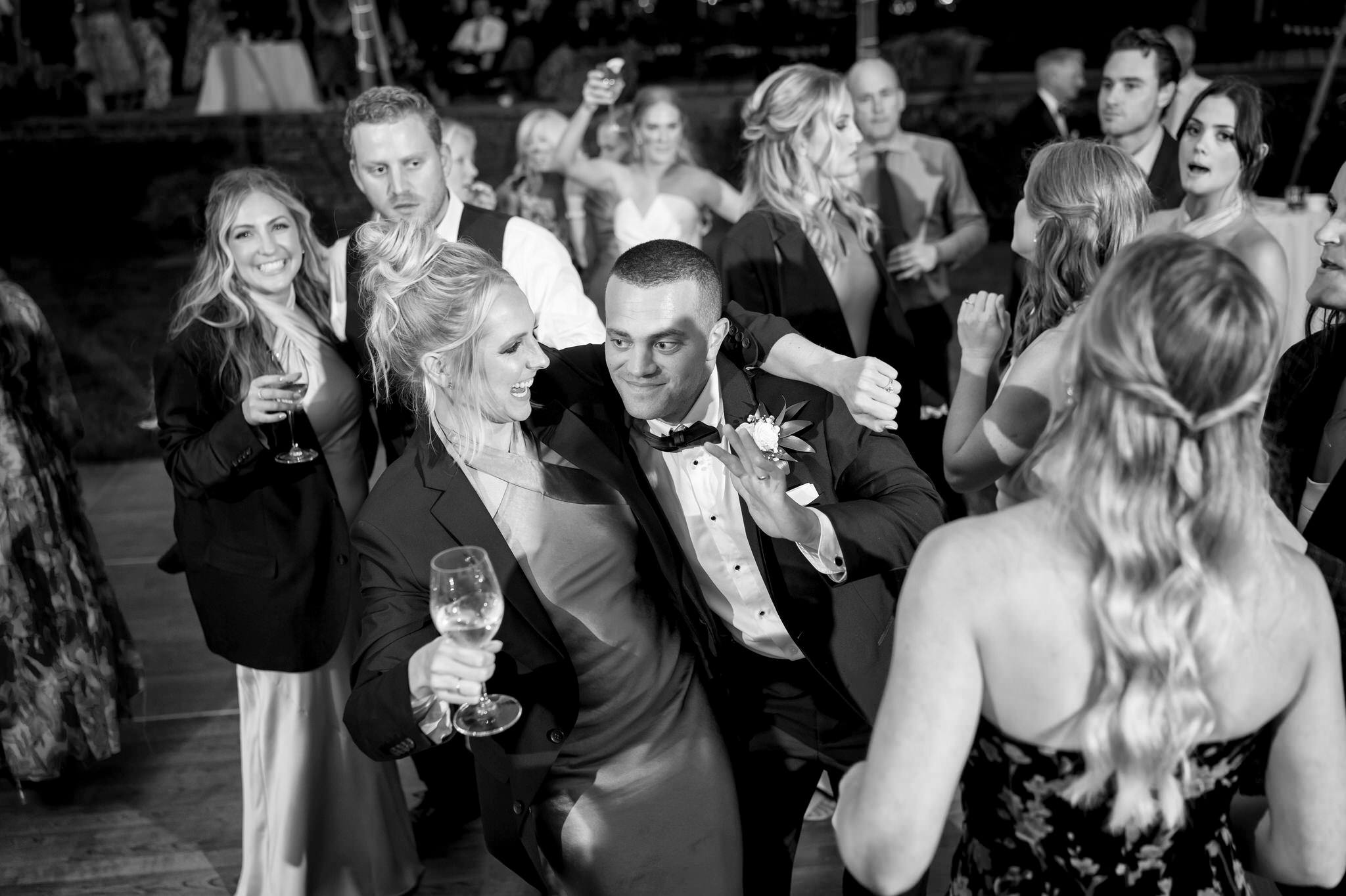 Guests enjoy themselves during a Country Club of Detroit wedding reception.  