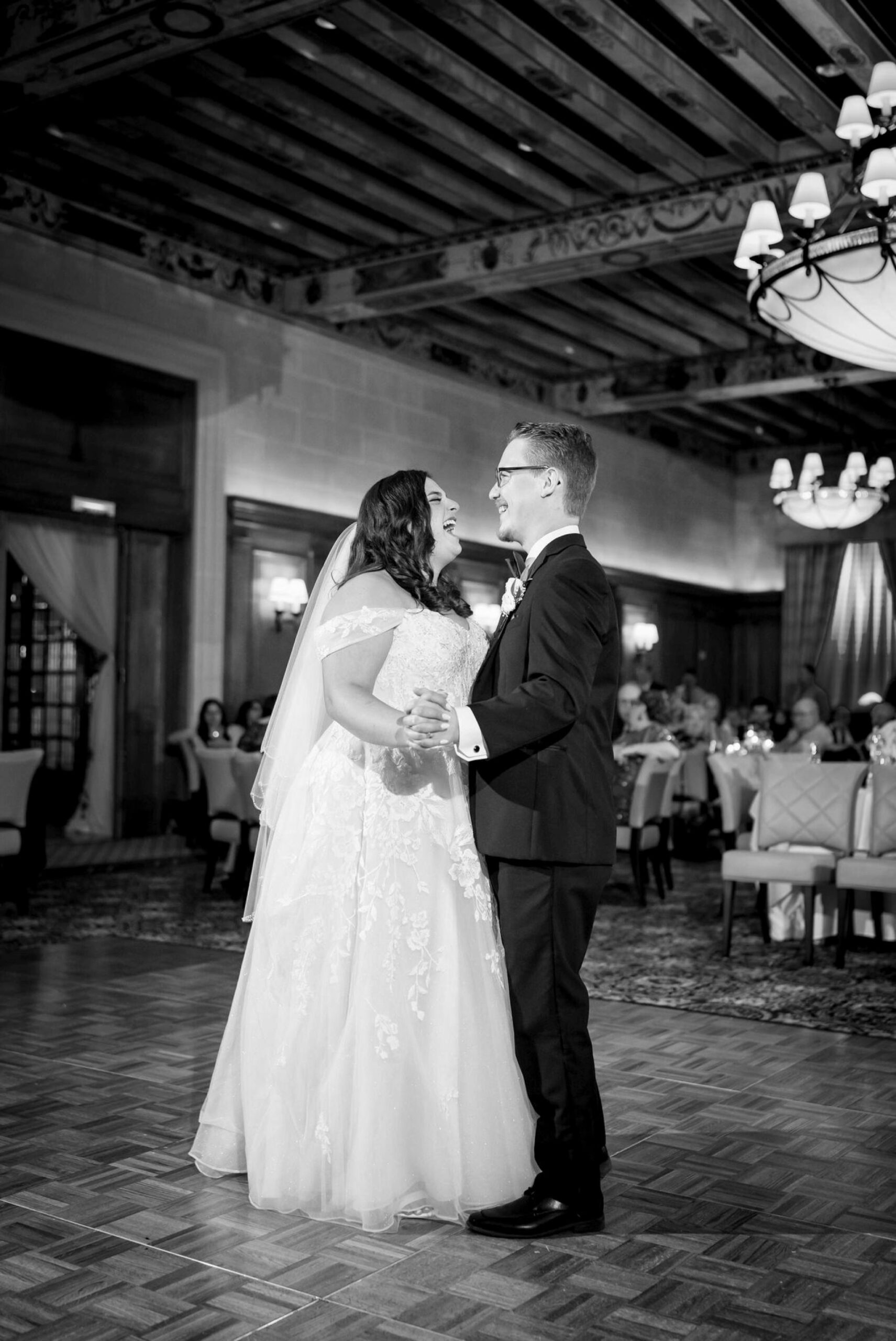 The bride and groom share their first dance at a Detroit Athletic Club wedding.