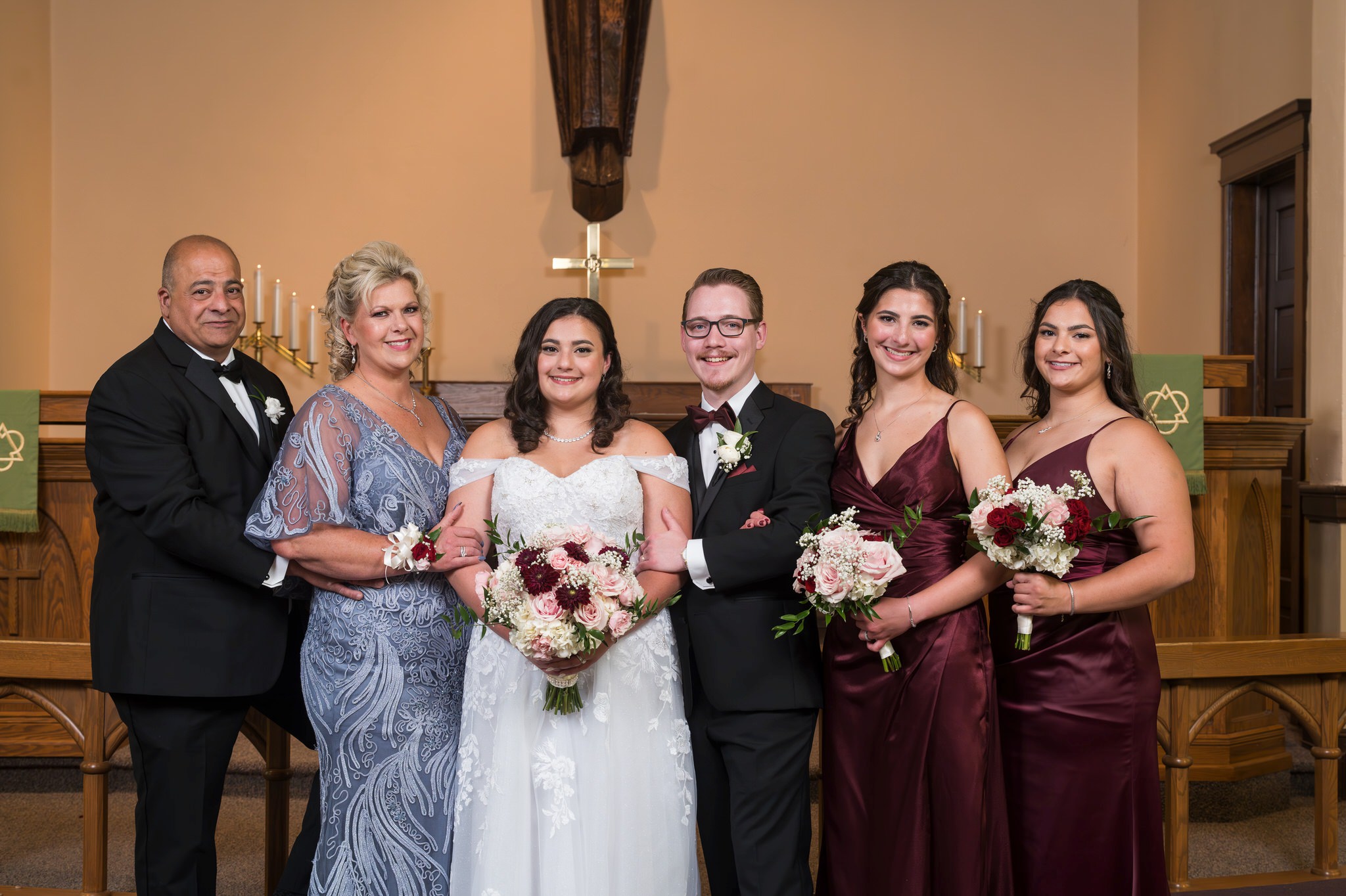 A family portrait on a wedding day at Immanuel Lutheran Church in Macomb, MI. 