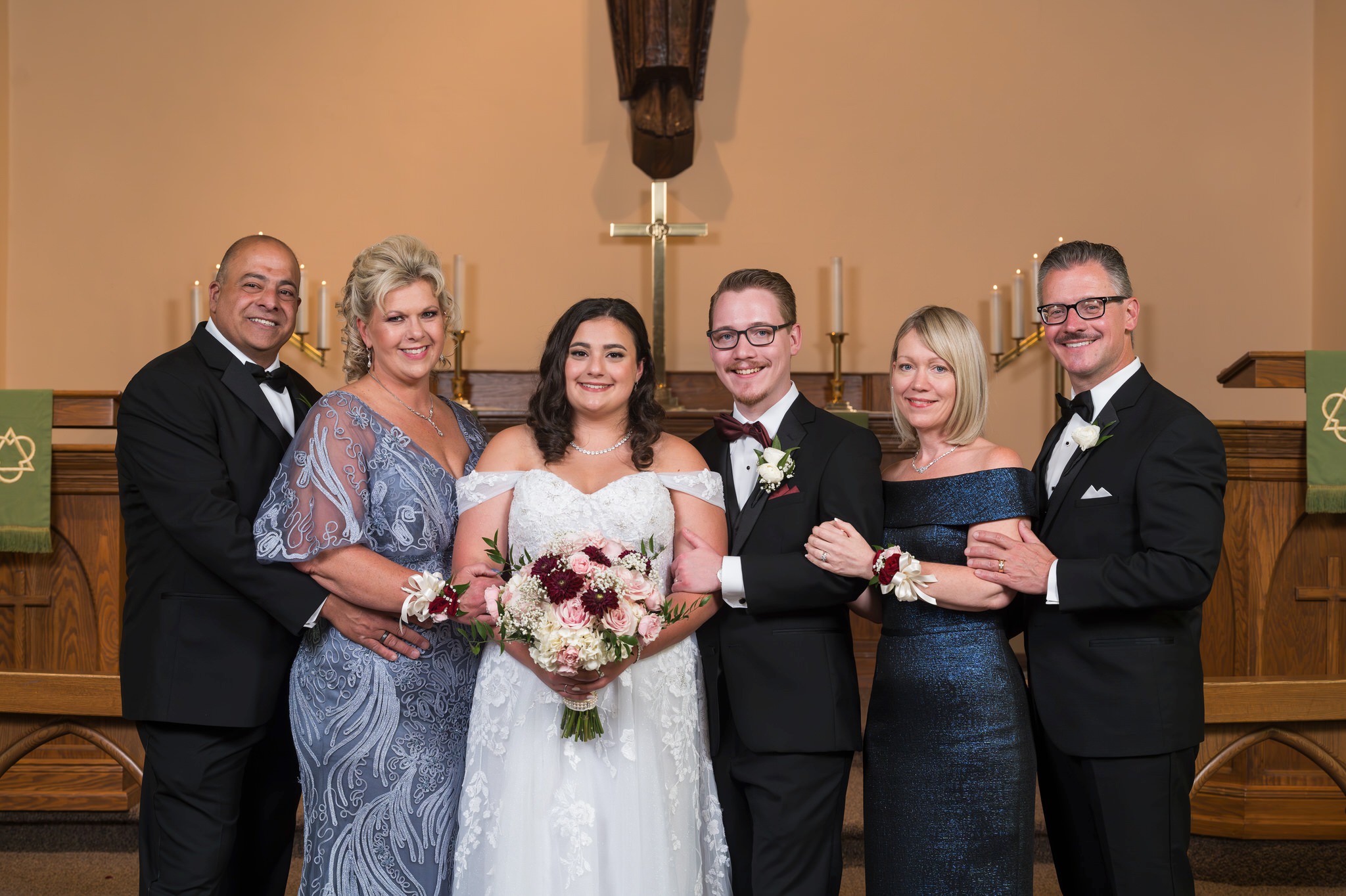 A family portrait on a wedding day at Immanuel Lutheran Church in Macomb, MI. 