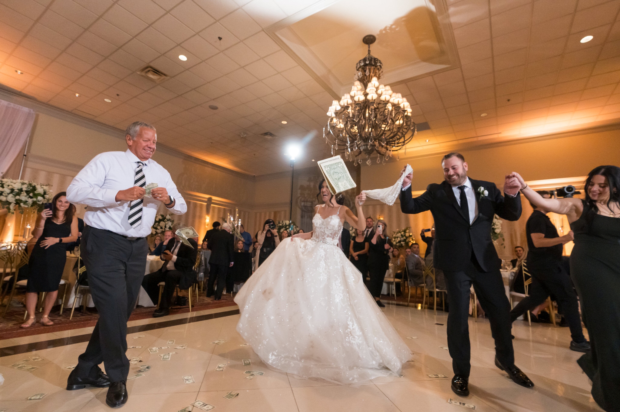 A Greek wedding dance takes place at Palazzo Grande wedding reception in Shelby Township, MI.  