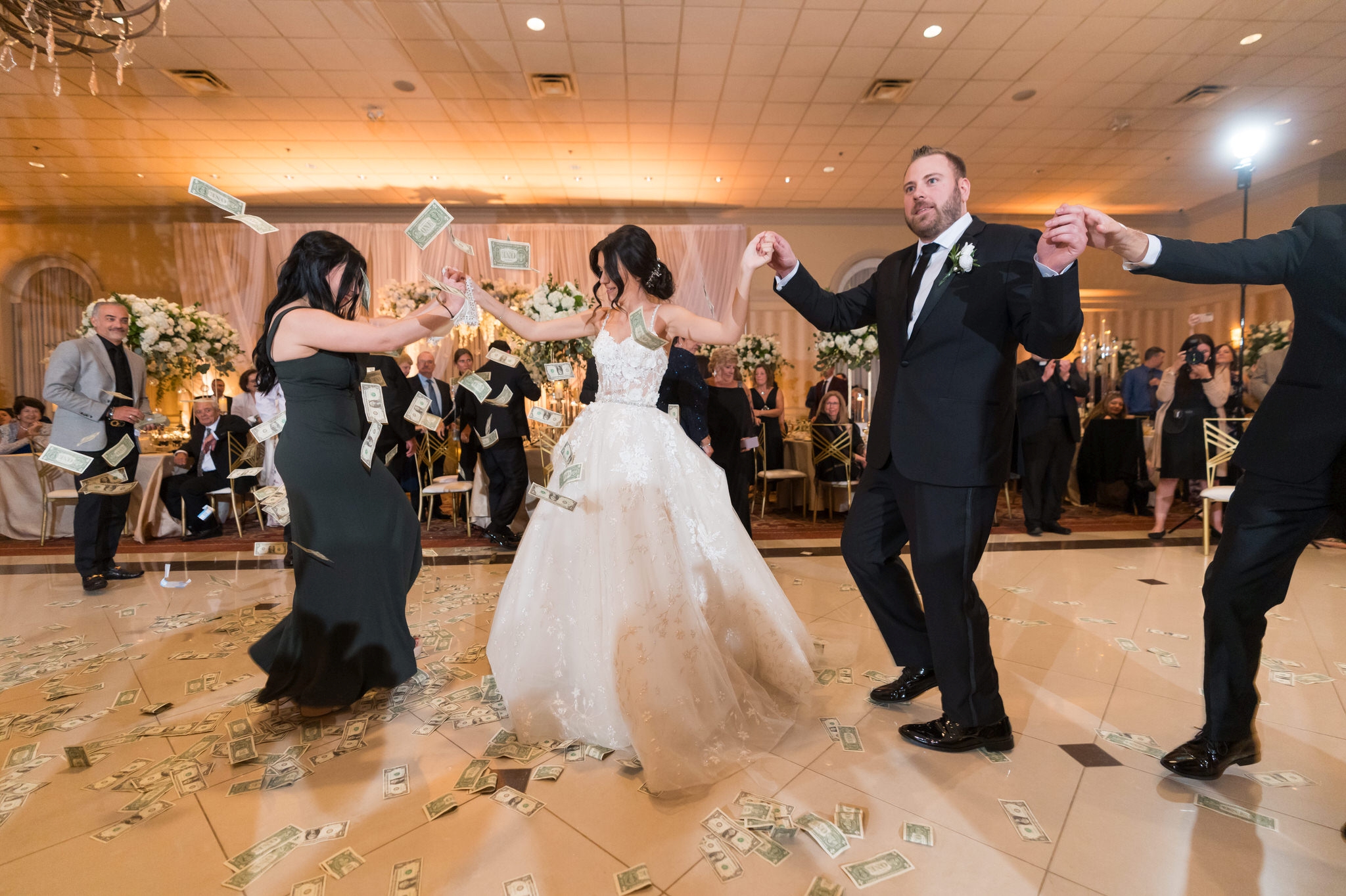 A Greek wedding dance takes place at Palazzo Grande wedding reception in Shelby Township, MI.  