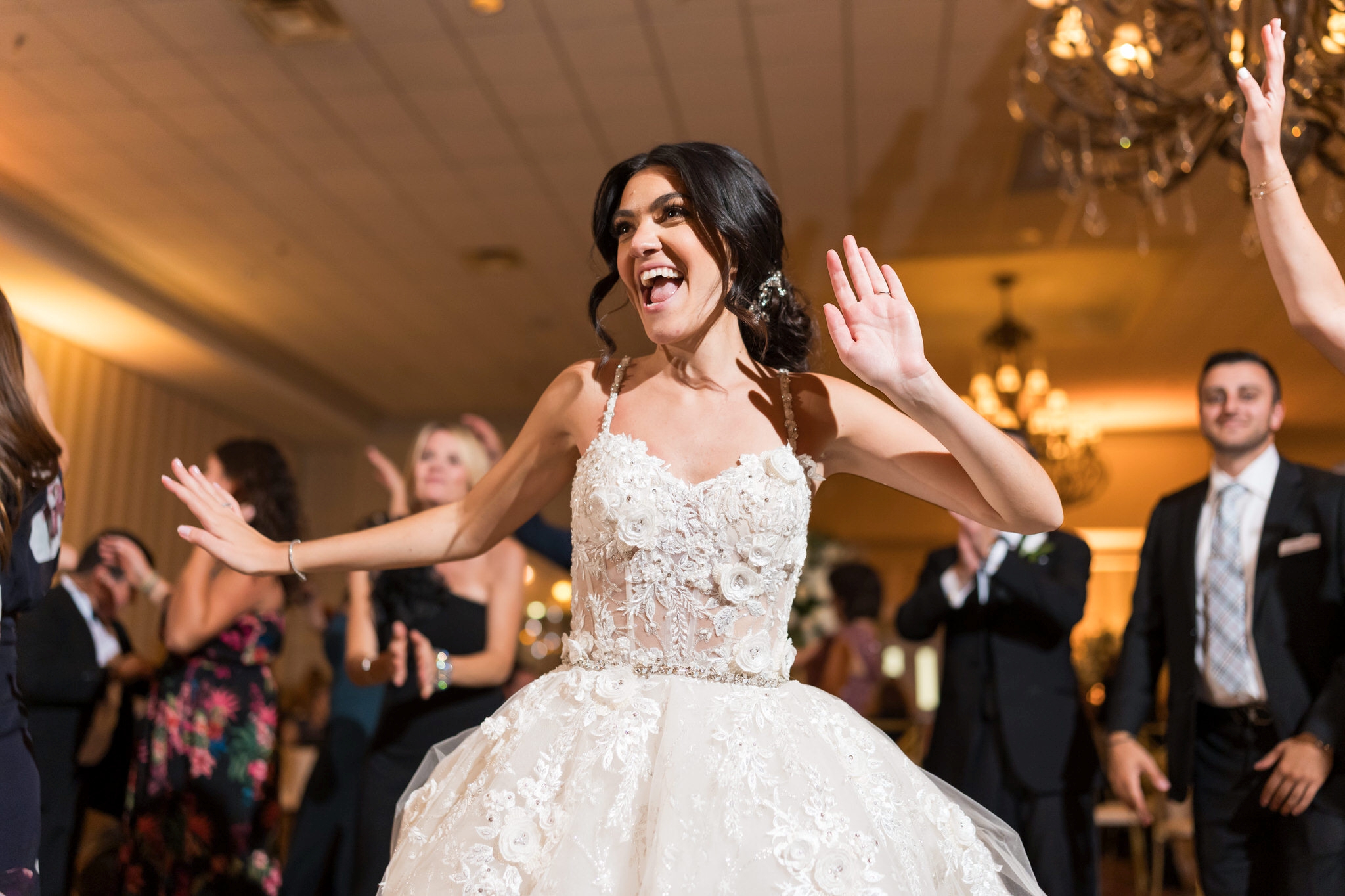 Bride dances at her wedding reception at Palazzo Grande in Shelby Township, MI.  