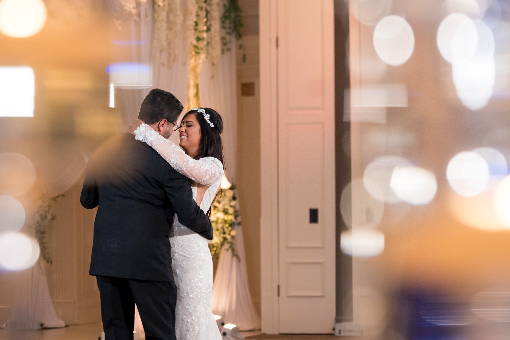 The bride and groom share a first dance  during their wedding reception at Penna's of Sterling. 
