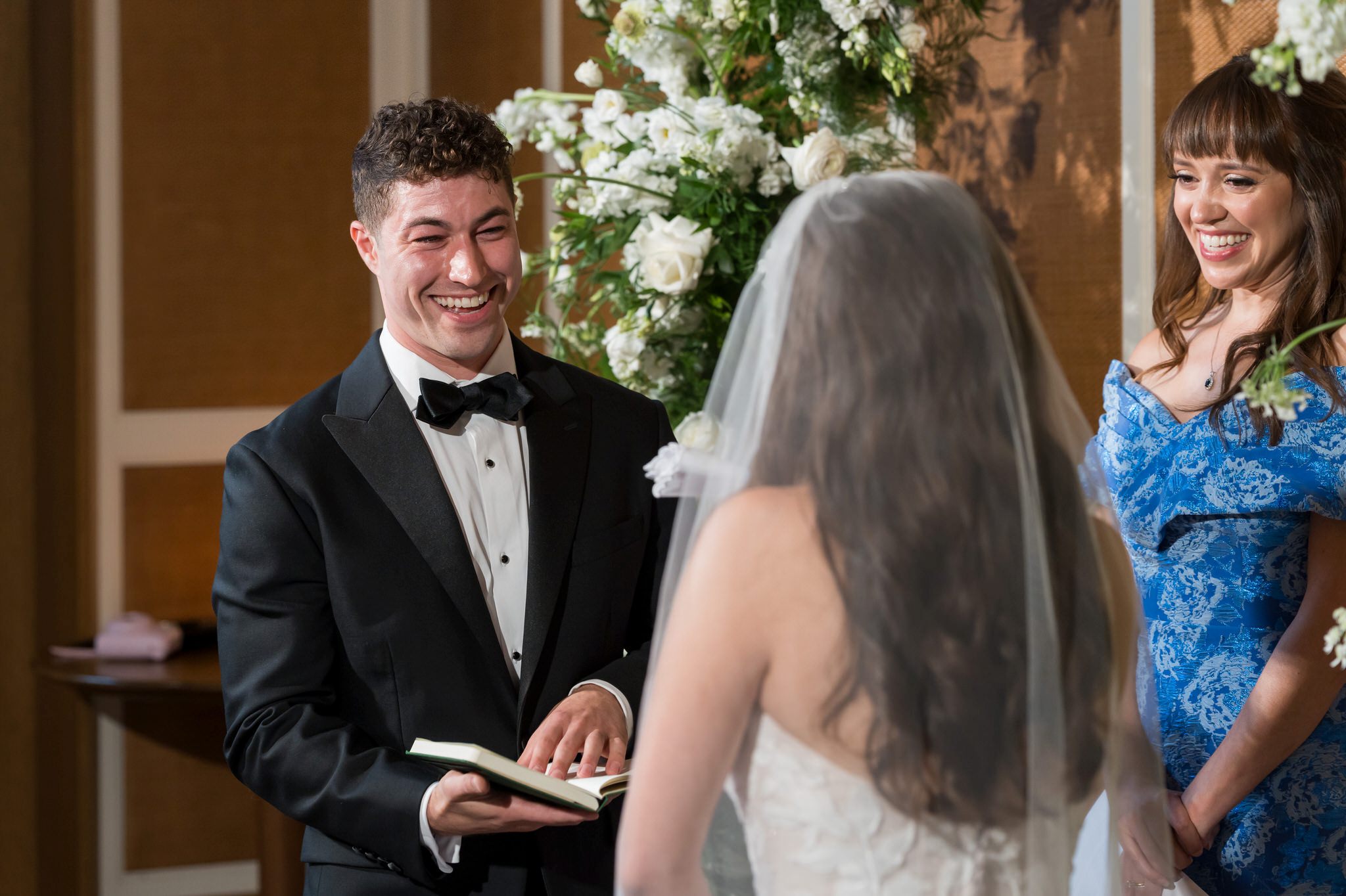 A bride and groom exchange vows during their San Morello wedding.  