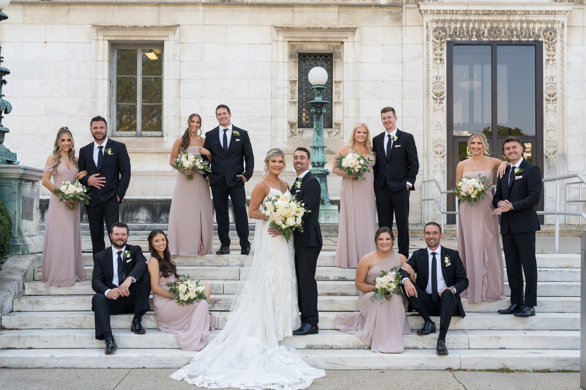 A bridal party poses like a Vanity Fair magazine cover during their Detroit wedding by Brian Weitzel Photography.  