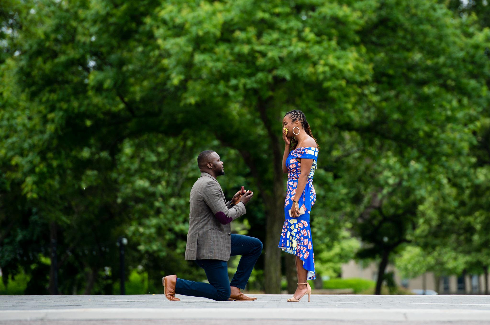 A gentleman offers a marriage proposal at DIA in Detroit.  